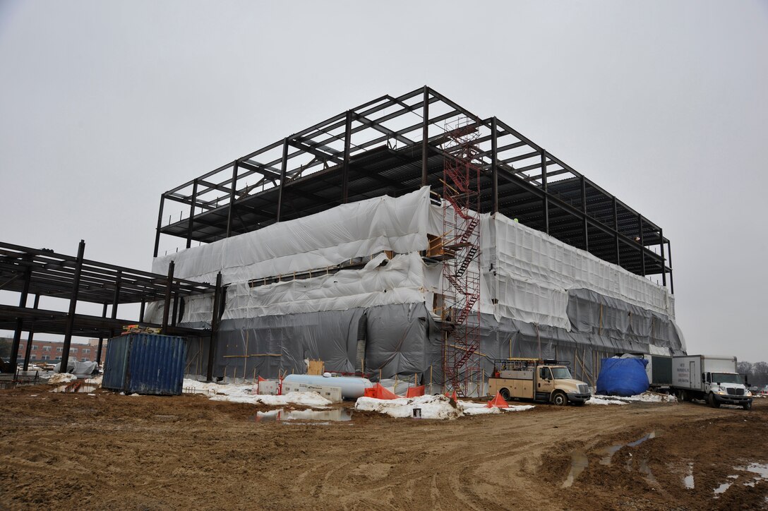 Contractors work on the new William A. Jones III headquarters building Feb. 23, 2010 at Joint Base Andrews, Md. The $114.2 Million building is Leadership in Energy and Environmental Design (LEED) Silver certified, and is slated to be five stories, 380,000 square feet, and will hold more than 2,500 personnel.  The building is scheduled to be completed next year. (U.S. Air Force photo by Airman 1st Class Perry Aston) (Released)