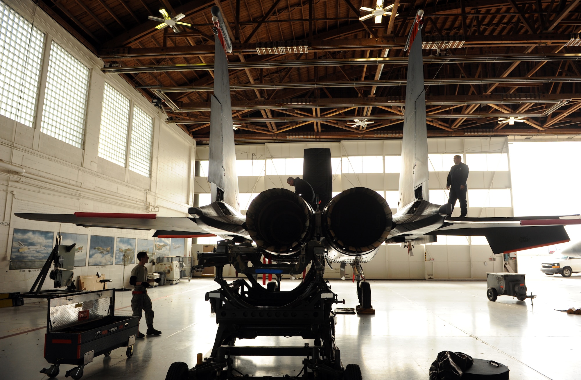 MOUNTAIN HOME AIR FORCE BASE, Idaho -- Airmen from the 389th Aircraft Maintenance Unit perform maintenance on an F-15E Strike Eagle Feb. 23. The 389th AMS is responsible for the flight line maintenance of 20 F-15E aircraft. (U.S. Air Force photo by Airman 1st Class Debbie Lockhart)