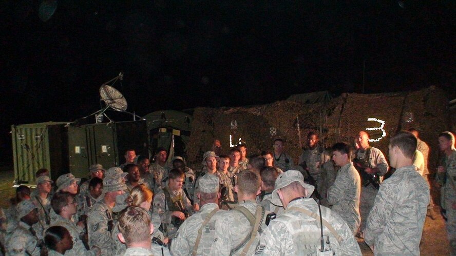 PORT-AU-PRINCE, Haiti -- Airmen from the 823rd Security Forces Squadron and 824th Security Forces Squadron prepare for a joint shift to provide security at the Toussaint L'Ouverture International Airport here in late February. The Moody Airmen are deployed to Haiti to assist in humanitarian relief operations. (Courtesy photo)
