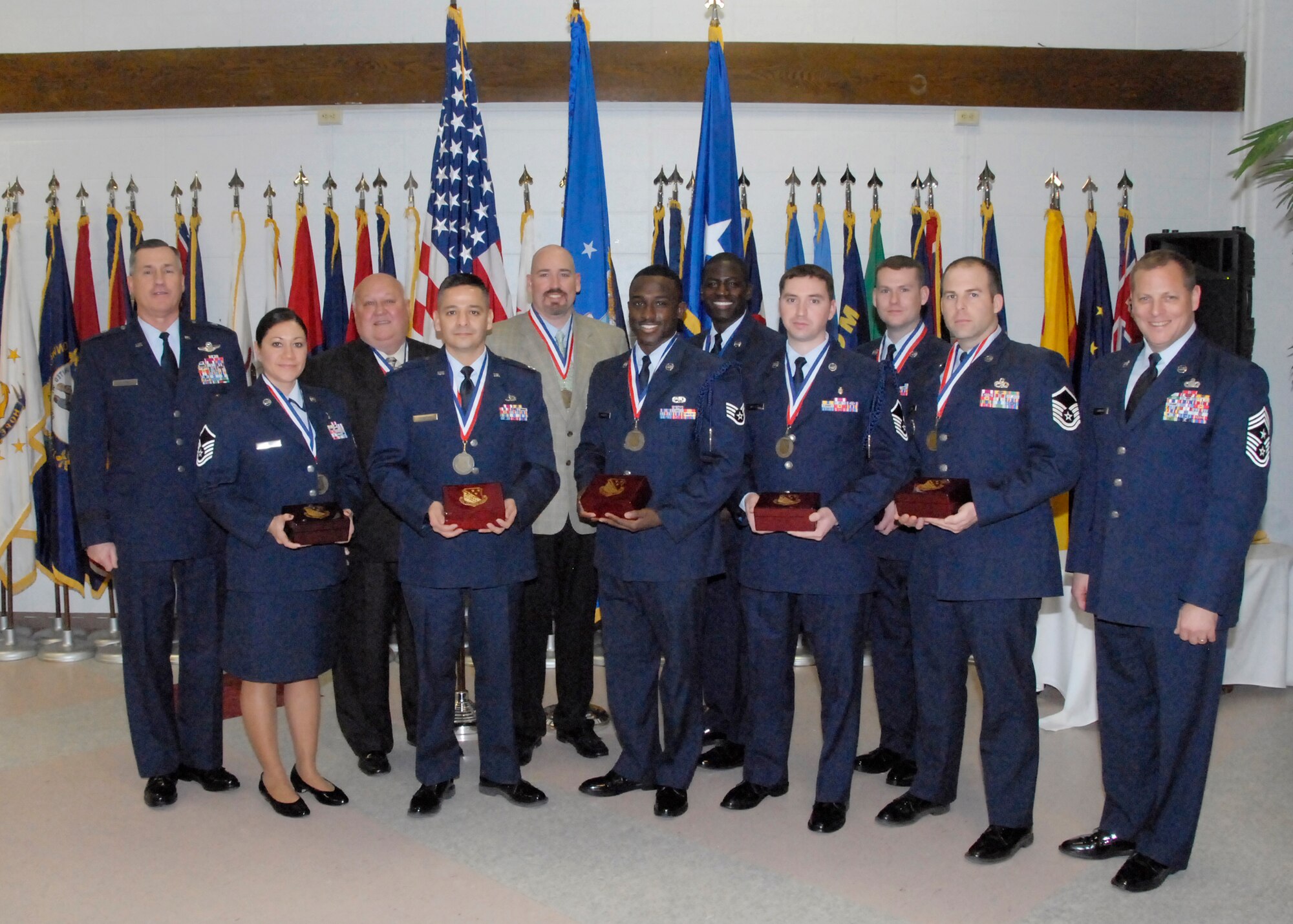 The 82nd Training Wing Technical Training Awards were presented by 82nd TRW Commander Brig. Gen. O.G. Mannon and Chief Master Sgt. Kenneth Sallinger, 82nd TRW command chief, Feb. 25 at the Sheppard Club. Pictured from left to right are Gen. Mannon, Master Sgt. Erica Perez, 882nd Training Group; David Ferry, 82nd TRG; Capt. Ricardo Cisneros, 364th Training Squadron; Jeffrey Pittman, 361st TRS; Staff Sgt. Lakeith Manson, 366th TRS; Staff Sgt. Joseph Lockhart, 366th TRS; Master Sgt. Charles Wheeler, 362nd TRS; Tech. Sgt. Paul Roller, 361st TRS; Master Sgt. Kenneth Dowd, 982nd TRG; and Chief Sallinger. Not pictured are Capt. Thomas Eckel, 366th TRS Detachment 3; Master Sgt. Joshua Ohl, 372nd TRS det. 17; Staff Sgt. Kevin Beasly, 366th TRS det. 3; and Airman 1st Class Anthony James, 882nd Training Support Squadron. (U.S. Air Force photo/Harry Tonemah)