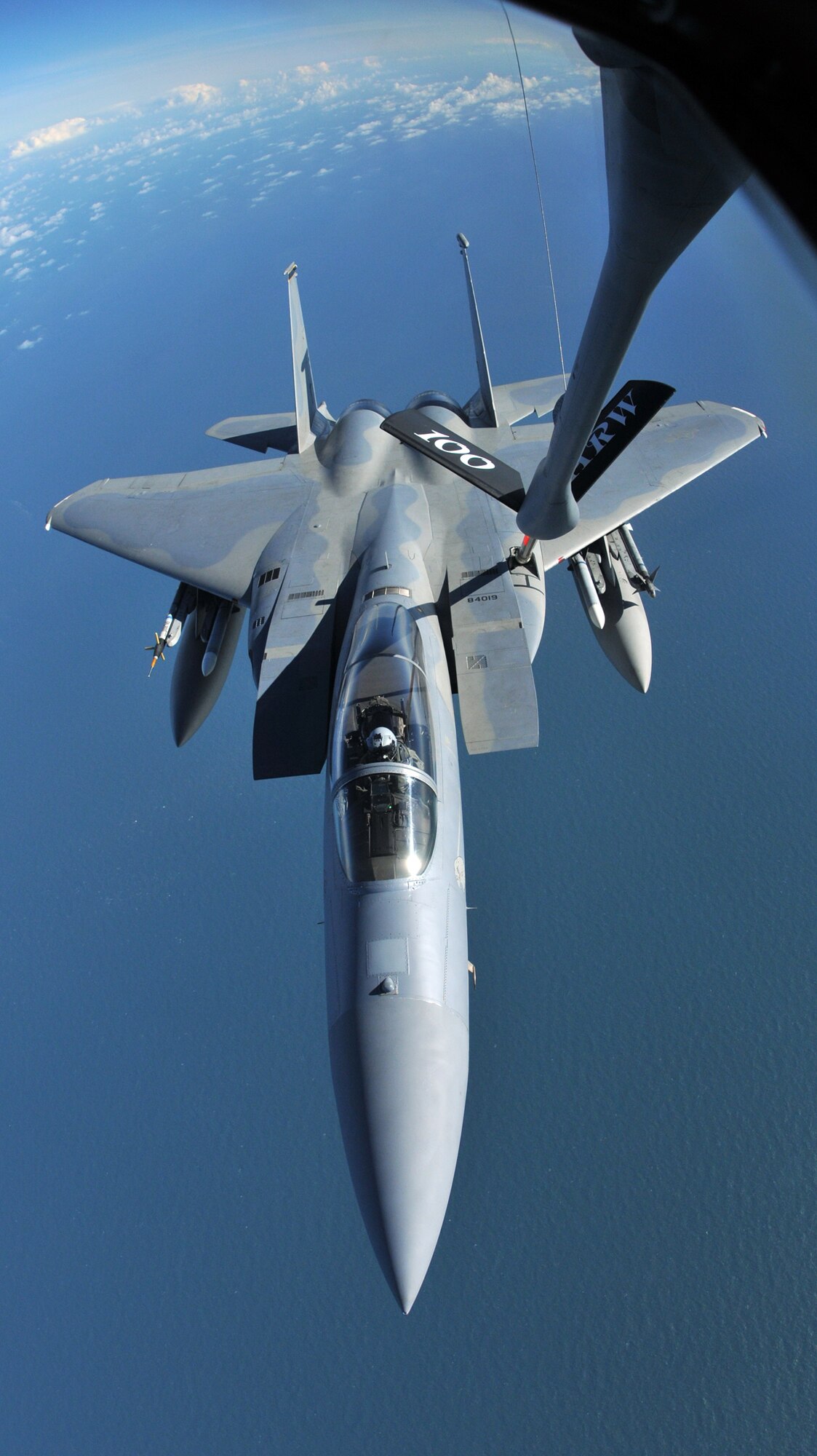 RAF MILDENHALL, England -- An F-15C Eagle from the 48th Fighter Wing, RAF Lakenheath, refuels off a KC-135 from the 100th Air Refueling Wing during a routine training sortie March 1.  (U.S. Air Force photo by Staff Sgt. Austin M. May)