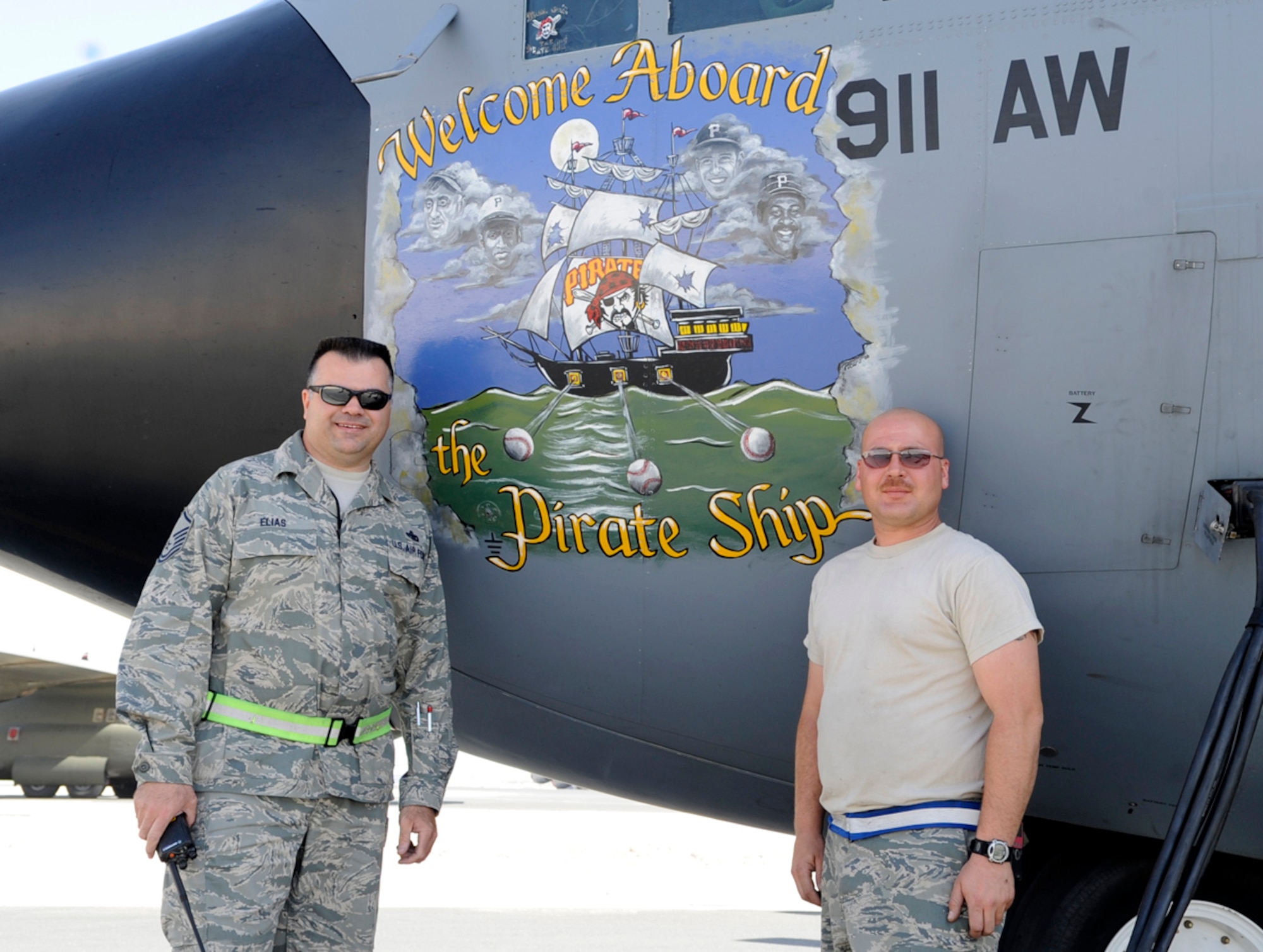 Deployed Air Force Reserve maintenance personnel from the 911th Airlift Wing, Pittsburgh Air Reserve Station, Pa. maintain their home-station aircraft. The C-130H Hercules performs intra-theater airlift supporting of Operations Enduring and Iraqi Freedom. While their friends and family back home battle record snowfall, the Pittsburgh Airmen attached to the 379th Air Expeditionary Wing at undisclosed base in Southwest Asia, support the ground battle in Marjah and elsewhere by delivering vital assets, ground equipment and personnel ? anything and everything needed to support the ground war. This C-130H was hand painted with a Pittsburgh Pirates? mural upon its nose to show its Pittsburgh Spirit as it flies combat missions throughout Southwest Asia waving a yellow tail-banner with the words Pittsburgh scrawled in black. Team Pittsburgh consists of multiple aircrew, aircraft, as well as numerous maintenance and support personnel. (U.S. Air Force Photo/Capt. Cathleen Snow)