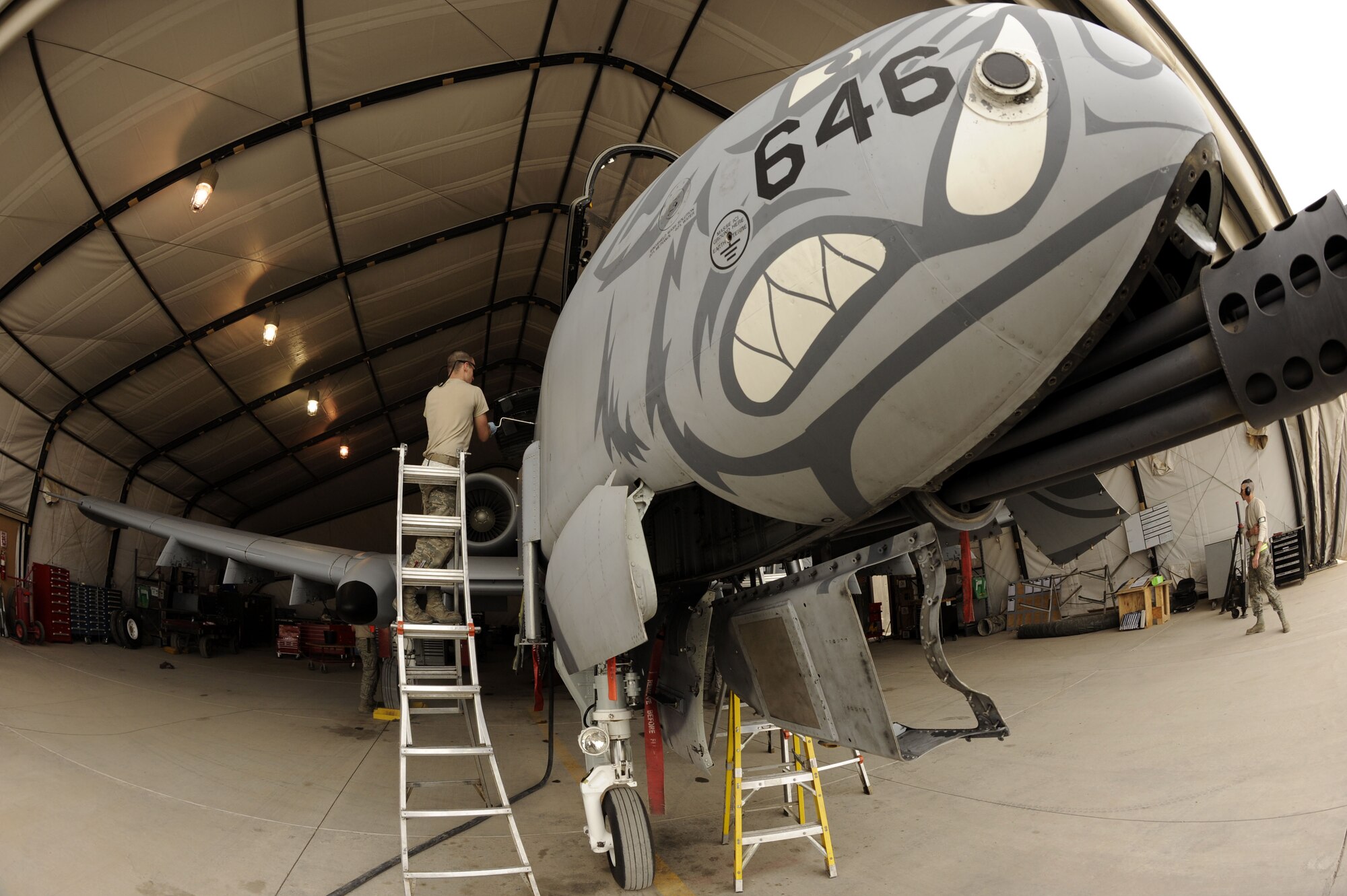 Airmen from the 104th Expeditionary Fighter Squadron, Air National Guard, Baltimore, Md., and 188th Wing, Fort Smith, Ark., will work and maintain the A-10 Thunderbolt II for the next 120 days.  ch. Sgt. Lew Smith, 451st Expeditionary Maintenance Squadron, conducts a phase inspection of an A-10 Thunderbolt II here Feb. 24.  Sergeant Smith is assigned to the 175th Maryland National Guard.  (U.S. Air Force photo by Senior Airman Nancy Hooks/Released)