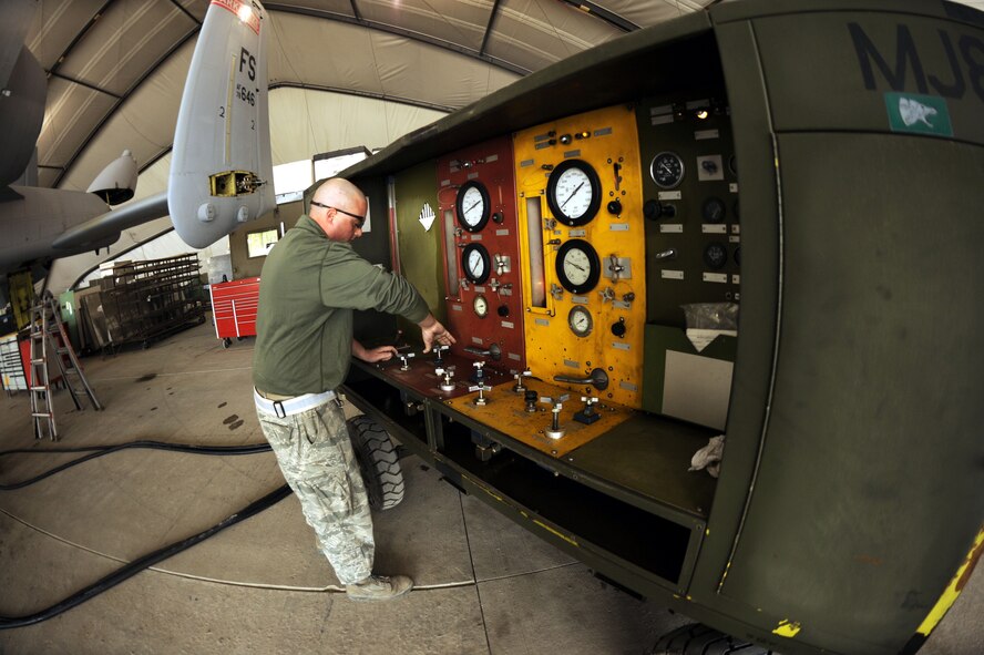 Tech. Sgt. John Scarcella, 451st Expeditionary Maintenance Squadron, conducts a phase inspection on an A10 Thunderbolt II in a hangar here Feb. 24, 2010.  This phase inspection is conducted after every 500 hours of flight.  Sergeant Scarcella is a traditional Guardsman from the 175th Maintenance Squadron, Maryland Air National Guard.  (U.S. Air Force photo by Senior Airman Nancy Hooks)