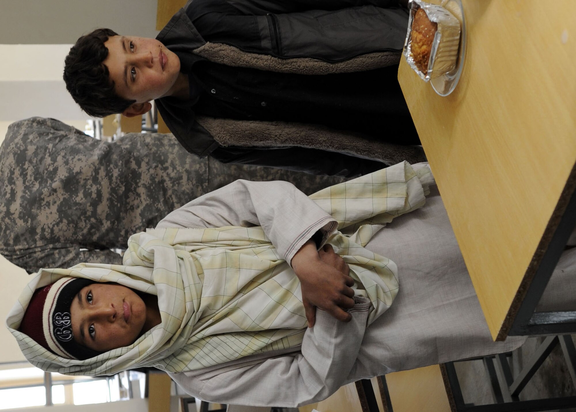 Afghan children attend the opening ceremony of the Sheik Mati Boy’s High School Feb. 25 in Qalat city of the Zabul Province in Afghanistan.  Two-hundred forty local boys will attend the long-awaited boys high school, and can live in the dormitory.  (U.S. Air Force photo by Senior Airman Nancy Hooks/Released)