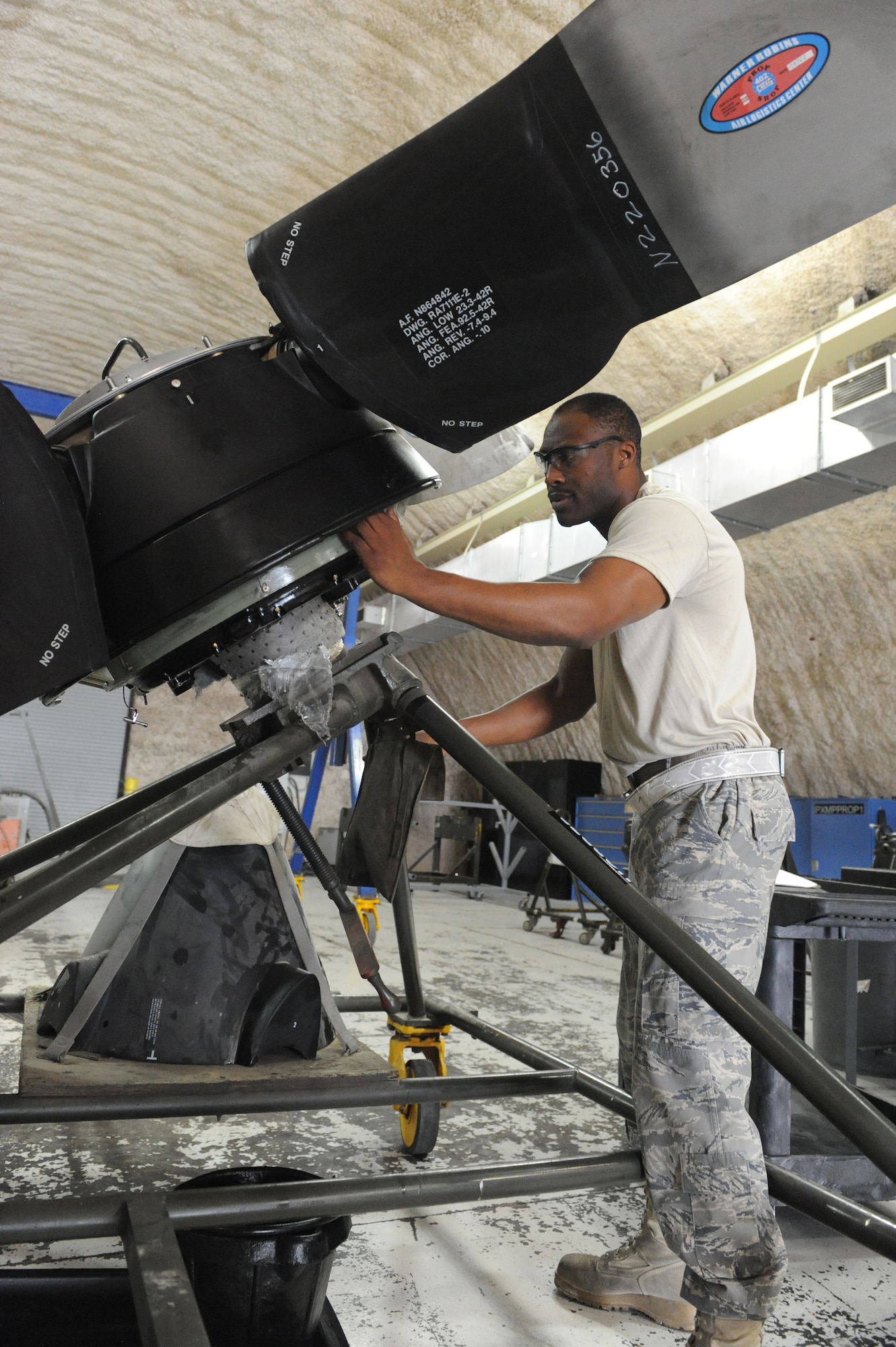 Senior Airman Terence Sharpe, 379th Expeditionary Maintenance Squadron aerospace propulsion journeyman, inspects a C-130 propeller assembly following a testing operation at a non-disclosed Southwest Asia location, Feb 23, 2010. (U.S. Air Force photo by Tech. Sgt. Michelle Larche)[RELEASED]