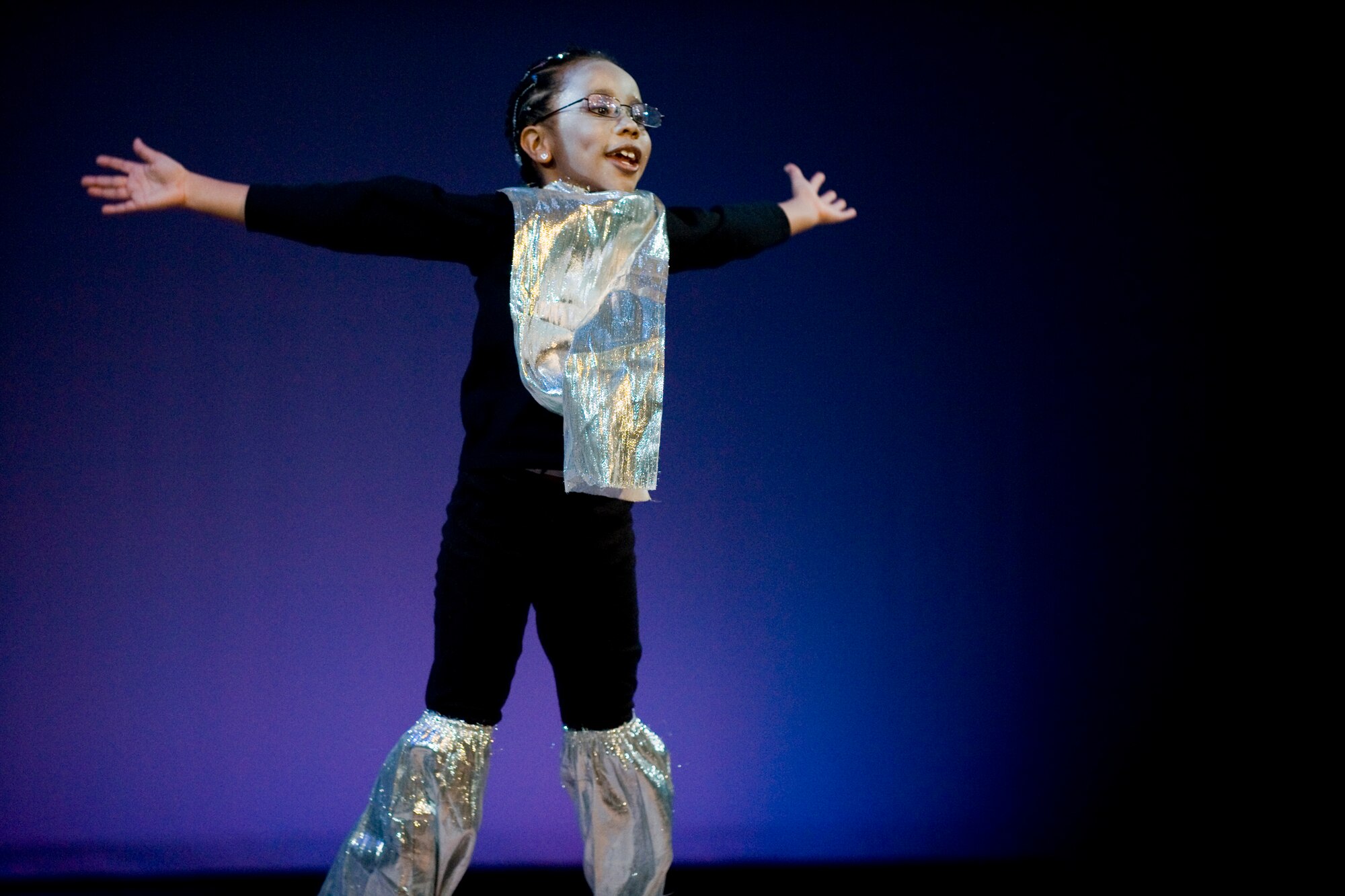 MISAWA CITY, Japan -- Dalia Smith introduces her character during a musical rendition of "Snow White" Feb. 28 at the Misawa International Center. Dalia played a mirror who always told the truth when asked a question. (U.S. Air Force photo/Senior Airman Jamal D. Sutter)