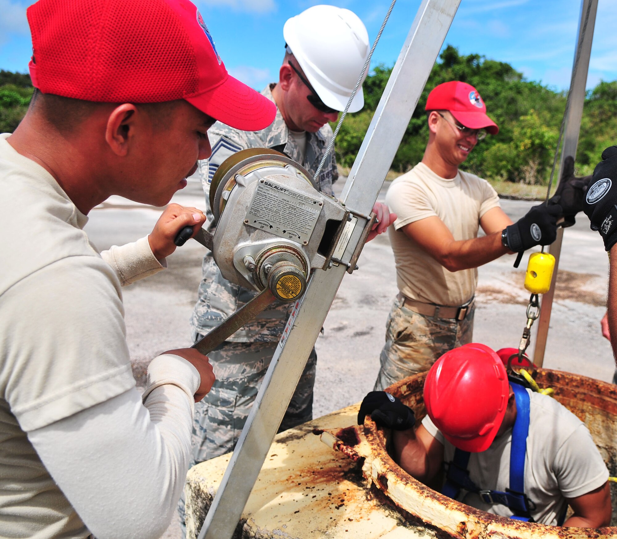 ANDERSEN AIR FORCE BASE, Guam - ANDERSEN AIR FORCE BASE, Guam - Members of the 554th Red Horse Squadronparticipate in confined space training here on Feb. 23. The confined spacetraining is a yearly requirement for certain airmen and was held by 36thWing Safety.(U.S. Air Force photo by Airman 1st Class Julian North)