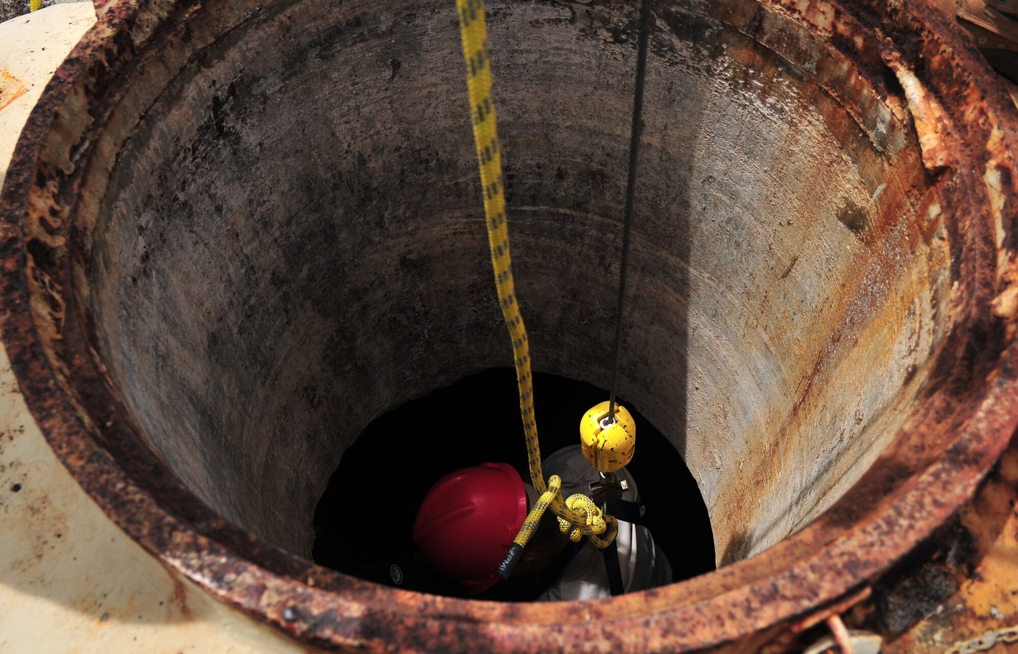 ANDERSEN AIR FORCE BASE, Guam - ANDERSEN AIR FORCE BASE, Guam - Members of the 554th Red Horse Squadron
participate in confined space training here on Feb. 23. The confined space
training is a yearly requirement for certain airmen and was held by 36th
Wing Safety.(U.S. Air Force photo by Airman 1st Class Julian North)