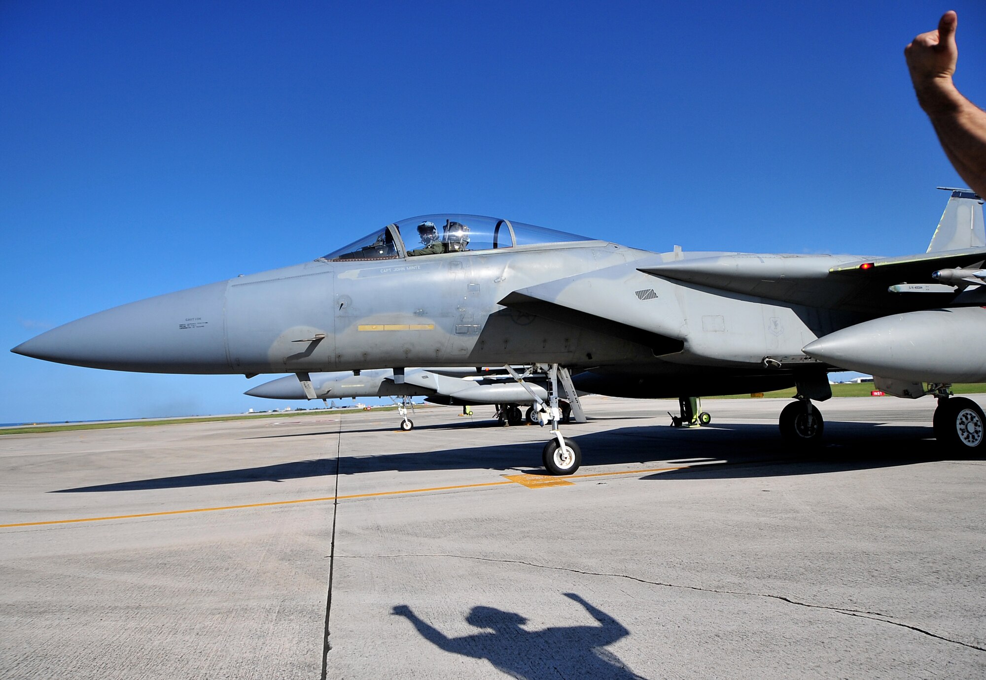 A small group of Airmen from the 67th Aircraft Maintenance Unit ensure F-15 Eagles get one final checkup at the end of runway before take-off Feb. 23. Kadena Airmen participated in joint bilateral training with other U.S. forces and the Japan Air Self Defense Force from Feb. 22-26.The training involved joint planning and the execution of missions in simulated hostile scenarios in development of theater security. (U.S. Air Force photo/Tech. Sgt. Rey Ramon)  
                                               
                                      
                                                    