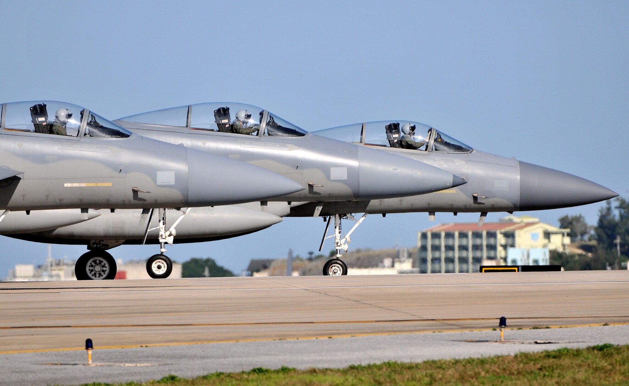 Kadena pilots line up in preparation for take-off near the end of runway Feb. 23. Kadena Airmen participated in joint bilateral training with other U.S. forces and the Japan Air Self Defense Force from Feb. 22-26.The training involved joint planning and the execution of missions in simulated hostile scenarios in development of theater security. (U.S. Air Force photo/Tech. Sgt. Rey Ramon) 
           
                                      
                                                    
