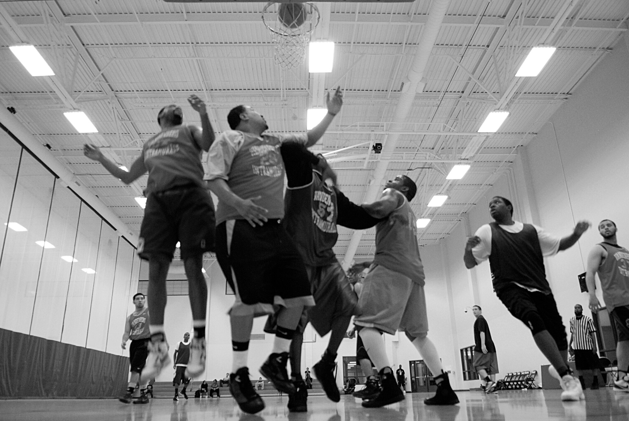 VANDENBERG AIR FORCE BASE, Calif. -- The 30th Launch Group and 30th Medical Group intramural basketball teams battle during a game at the Vandenberg Fitness Center here Monday, March 1, 2010.  The 30th LCG took the game, winning 64-60.  (U.S. Air Force photo illustration/Senior Airman Andrew Satran) 

 
 
 
 
 
 
 