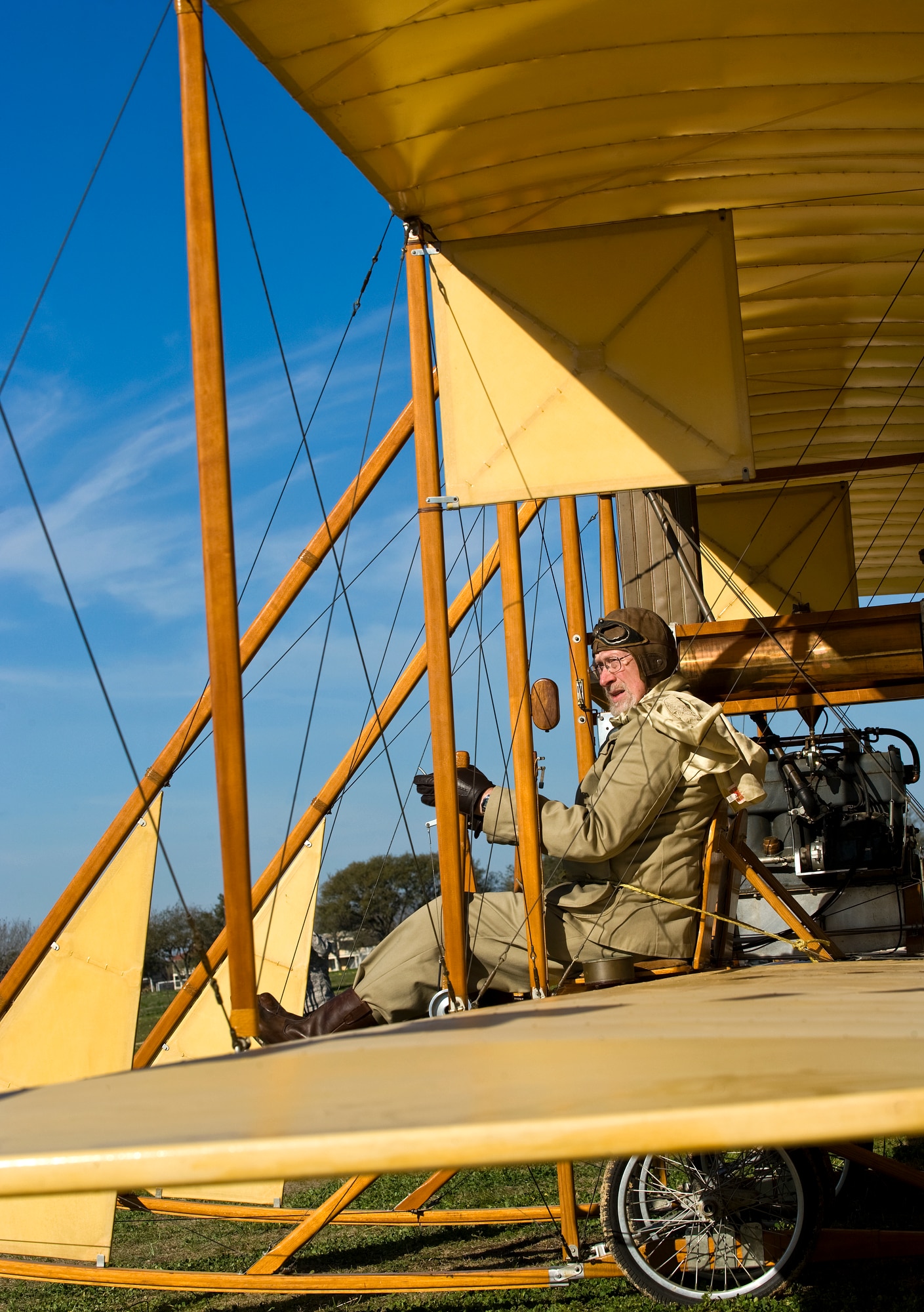 Don Gum, Wright "B" Flyer pilot, taxis a replica down the MacArthur Parade Ground at Fort Sam Houston, Texas, during the Foulois Centennial Military Flight Celebration event March 2, 2010. (U.S. Air Force photo/Staff Sgt. Bennie J. Davis III) 
