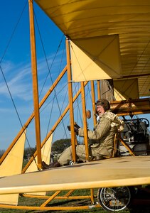 Don Gum, Wright "B" Flyer pilot, taxis a replica down the MacArthur Parade Ground at Fort Sam Houston, Texas, during the Foulois Centennial Military Flight Celebration event March 2, 2010. (U.S. Air Force photo/Staff Sgt. Bennie J. Davis III) 