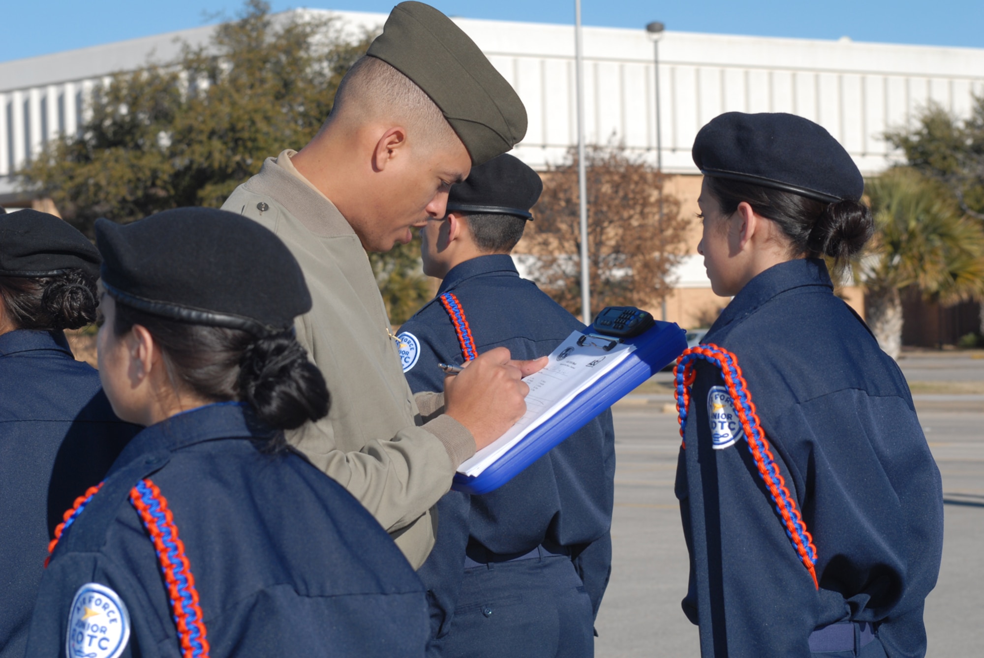 SAN ANGELO, Texas -- Marine Sgt. Roy Singleton inspects cadets from San Angelo Central High School during the Junior Reserve Officers’ Training Corps drill meet hosted by Angelo State University ROTC, Feb. 27, 2010. Sergeant Singleton is assigned to the Marine Corps Detachment, Goodfellow Air Force Base, Texas. (U.S. Air Force photo/Staff Sgt. Laura R. McFarlane)   