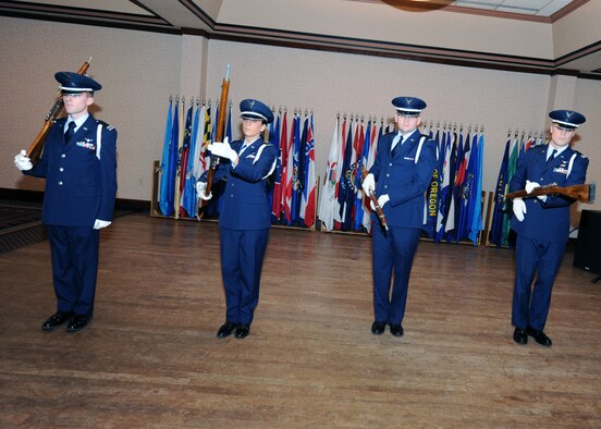 MINOT, N.D. –Members of the University of North Dakota Reserve Officer Training Corps drill team perform during the 21st annual International Military Ball at the Minot Holiday Inn-Riverside Feb. 27. The formal event included performances by Night Wing, The Winnipeg Bagpipers and the University of North Dakota Reserve Officer Training Corps drill team. The evening included dignitaries from the United States and Canada. (U.S. Air Force photo by Senior Airman Sharida Jackson)