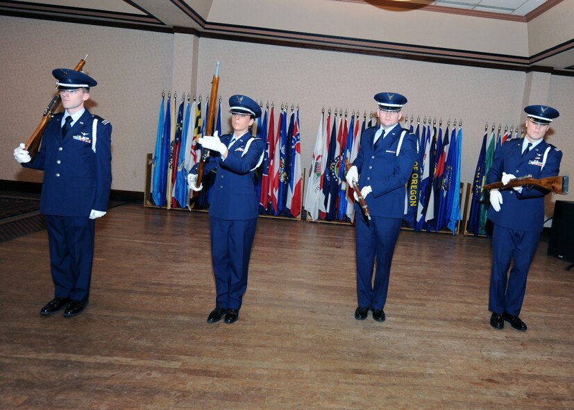 MINOT, N.D. –Members of the University of North Dakota Reserve Officer Training Corps drill team perform during the 21st annual International Military Ball at the Minot Holiday Inn-Riverside Feb. 27. The formal event included performances by Night Wing, The Winnipeg Bagpipers and the University of North Dakota Reserve Officer Training Corps drill team. The evening included dignitaries from the United States and Canada. (U.S. Air Force photo by Senior Airman Sharida Jackson)