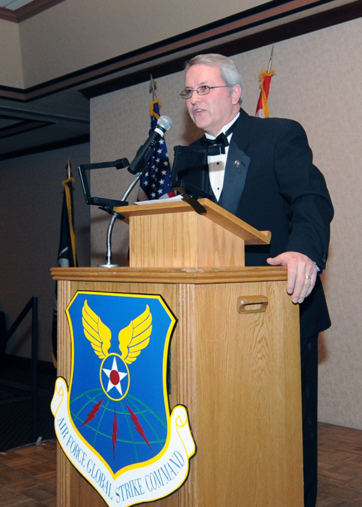 MINOT, N.D. – Randy Burckhard, Minot City Council member, speaks during the 21st annual International Military Ball at the Minot Holiday Inn-Riverside Feb. 27. The formal event included performances by Night Wing, The Winnipeg Bagpipers and the University of North Dakota Reserve Officer Training Corps drill team. The evening included dignitaries from the United States and Canada. (U.S. Air Force photo by Senior Airman Sharida Jackson)