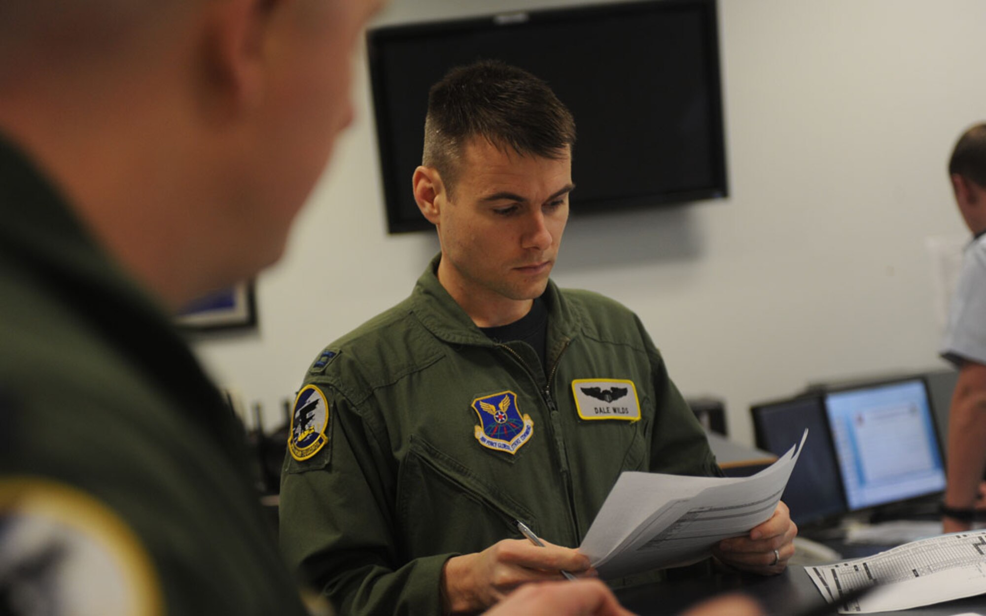 MINOT AIR FORCE BASE, N.D. – Capt. Dale Wilds, 69th Bomb Squadron B-52H
Stratofortress pilot, reviews a flight plan before a training mission March
1. The 69th BS is the fourth operational B-52H Stratofortress squadron in
the Air Force and the second squadron at Minot Air Force Base. (U.S. Air
Force photo by Senior Airman Sharida Jackson)
