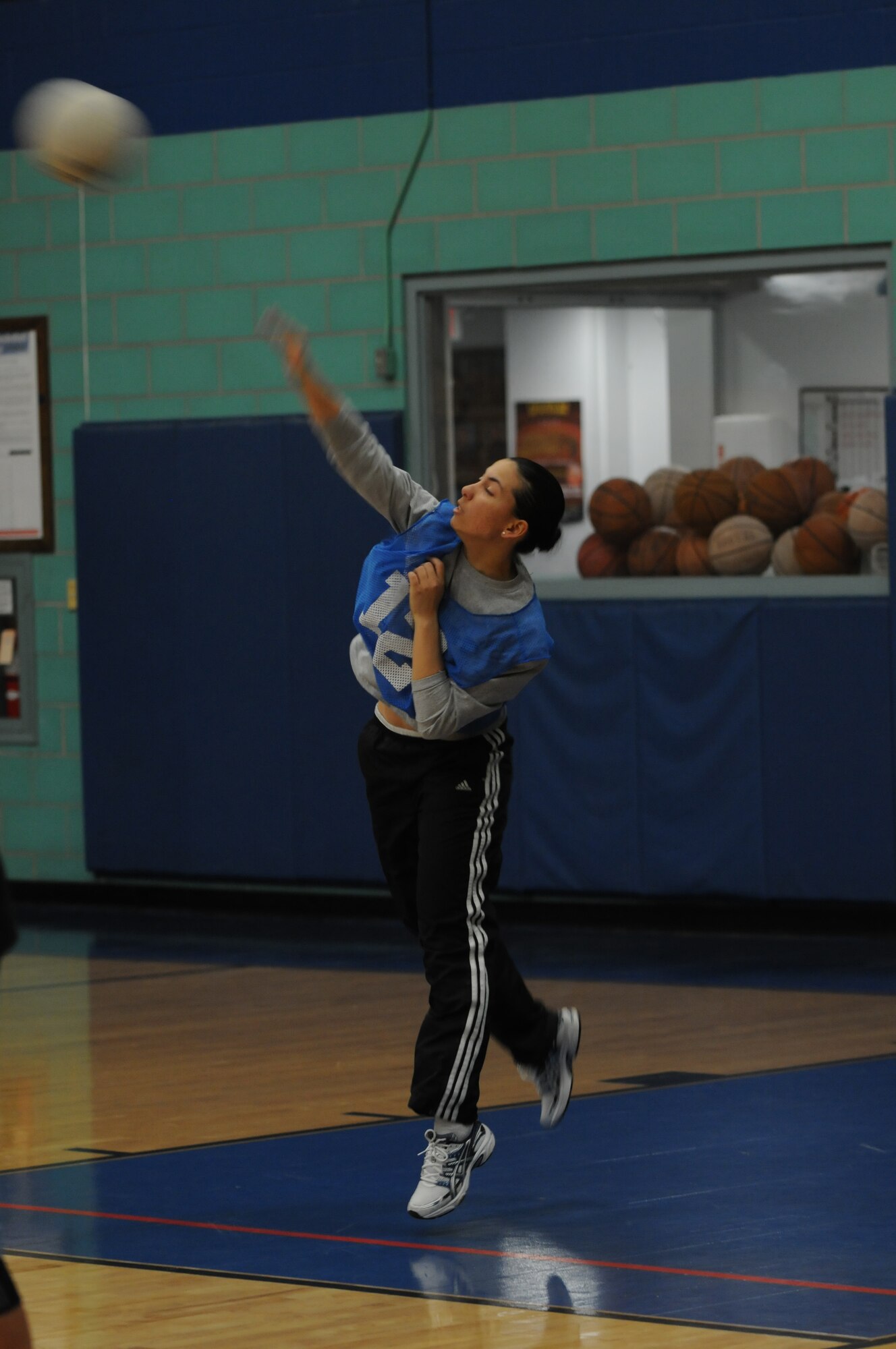 GOODFELLOW AIR FORCE BASE, Texas -- Airman 1st Class Natalia Baez-Alvarez, 316th Training Squadron, serves during a volleyball match, Feb. 25, 2010. The 316th Sharks won their set against the 344th Military Intelligence Battalion. (U.S. Air Force photo/Airman 1st Class Clayton Lenhardt)