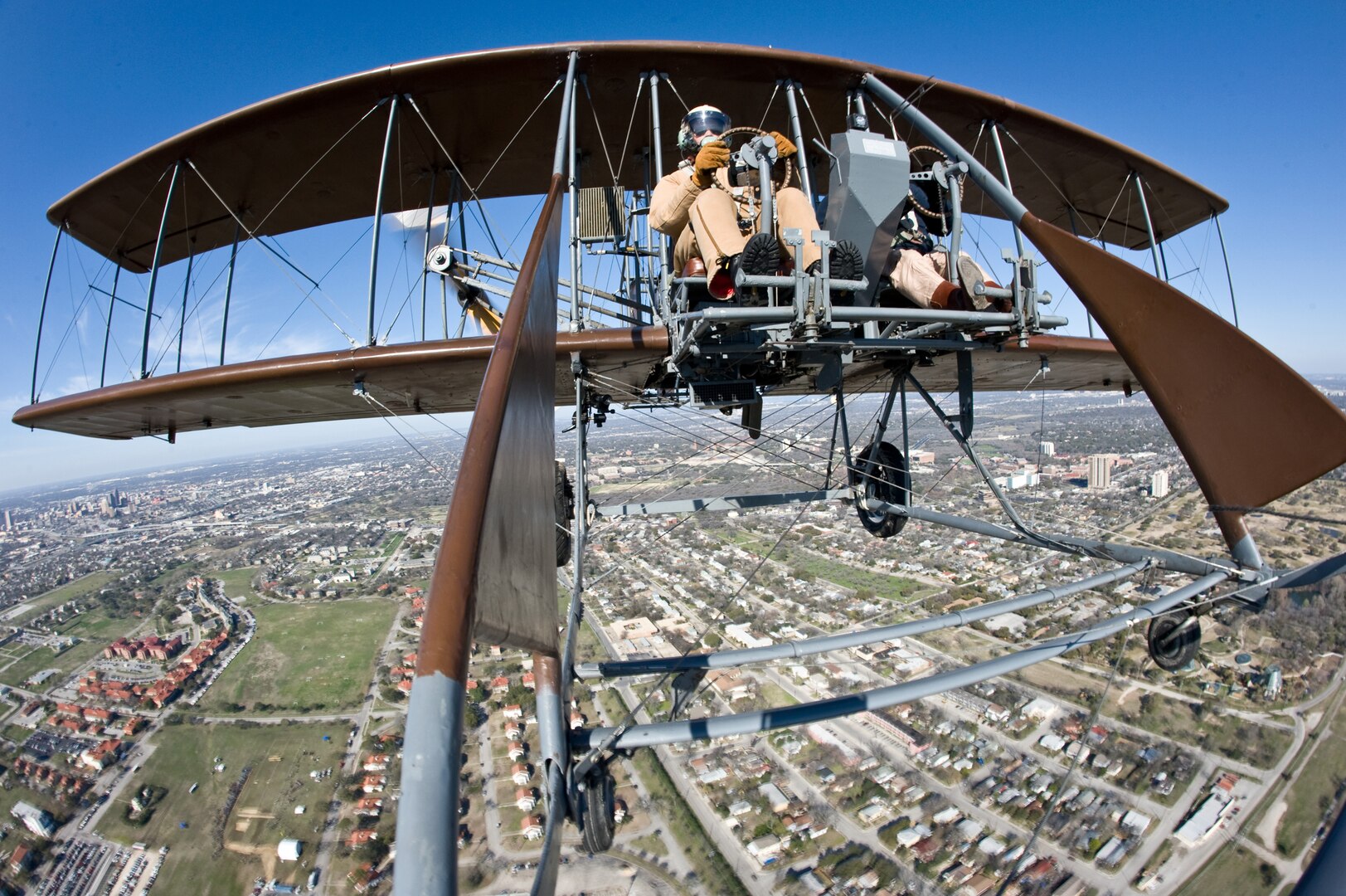 Rich Stepler and Don Stroud, Wright "B" Flyer pilots, performed a demonstration flight of their "Brown Bird" March 2, 2010, over MacArthur Parade Ground at Fort Sam Houston, Texas, during the Foulois Centennial Military Flight Celebration event.  (U.S. Air Force photo/Lance Cheung) 