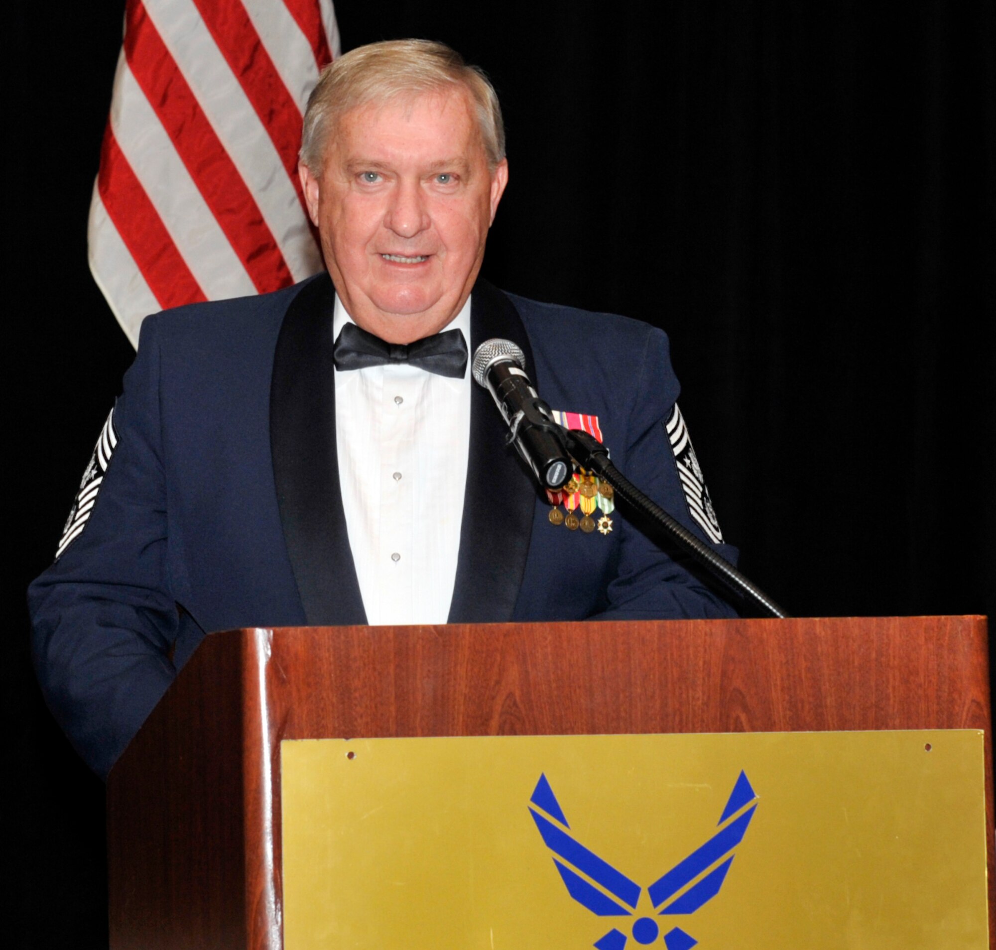Retired Chief Master Sergeant of the Air Force, James C. Binnicker speaks at an Airey NCO Academy graduation Feb. 18. (U.S. Air Force photo by Jonathan Gibson)