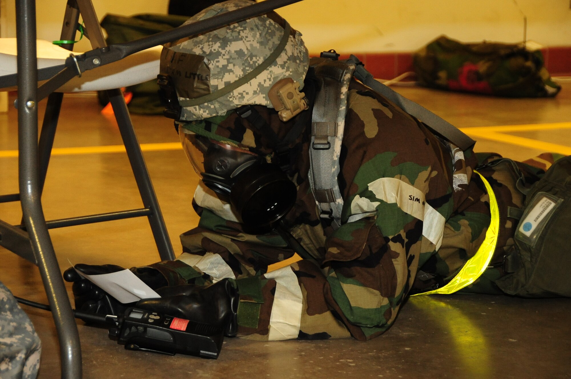 ELLSWORTH AIR FORCE BASE, S.D. -- Master Sgt. William Little, 28th Logistics Readiness Squadron NCO in charge of compliance and analysis, reads over an exercise inject during a Phase II Operational Readiness Exercise, March 2.  The Phase II ORE is designed to simulate a deployed environment and test the combat abilities of Ellsworth's Airmen. (U.S. Air Force photo/Airman 1st Class Anthony Sanchelli)