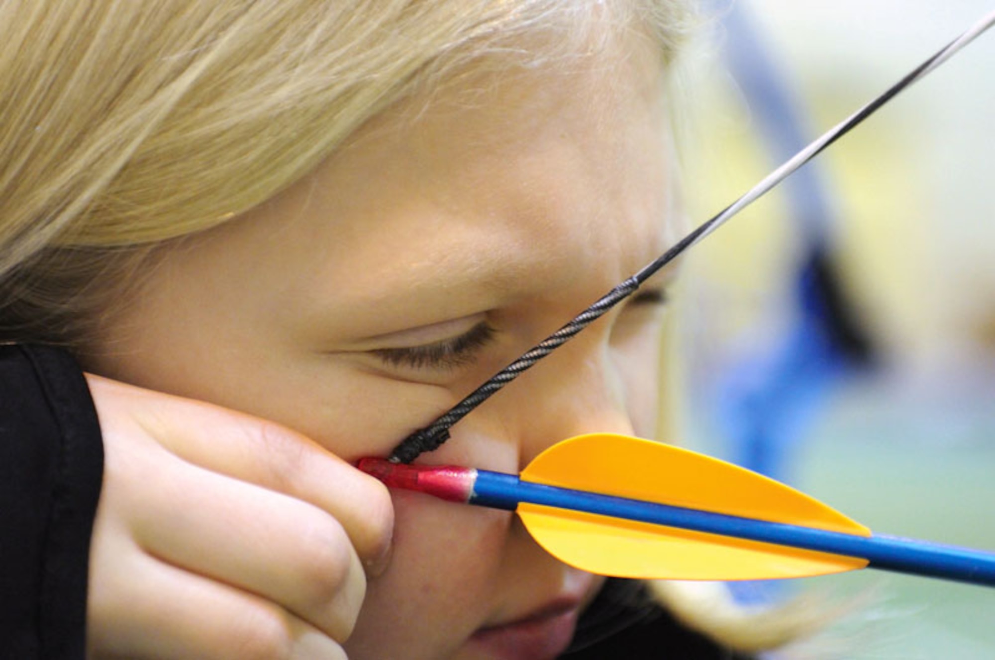 FORT RICHARDSON, Alaska -- Victoria Miller, 10, daughter of Army 1st Sgt. Shad Miller Jr., 3rd Battalion, 509th Parachute Infantry Regiment, draws a bead on a bullseye Jan. 7 at Fort Richardson’s Youth Services facility.(U.S. Army photo/ David Bedard/ Fort Richardson Public Affairs)