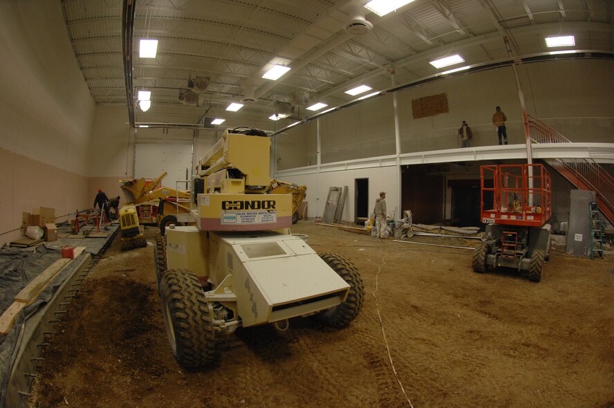 MINOT AIR FORCE BASE, N.D. -- Base contractors work on a new bay in the 91st Missile Wing headquarters building Feb 25. The contractors are adding a new bay so more tractor trailers can use the loading docks. (U.S. Air Force photo by Airman 1st Class Aaron-Forrest Wainwright)