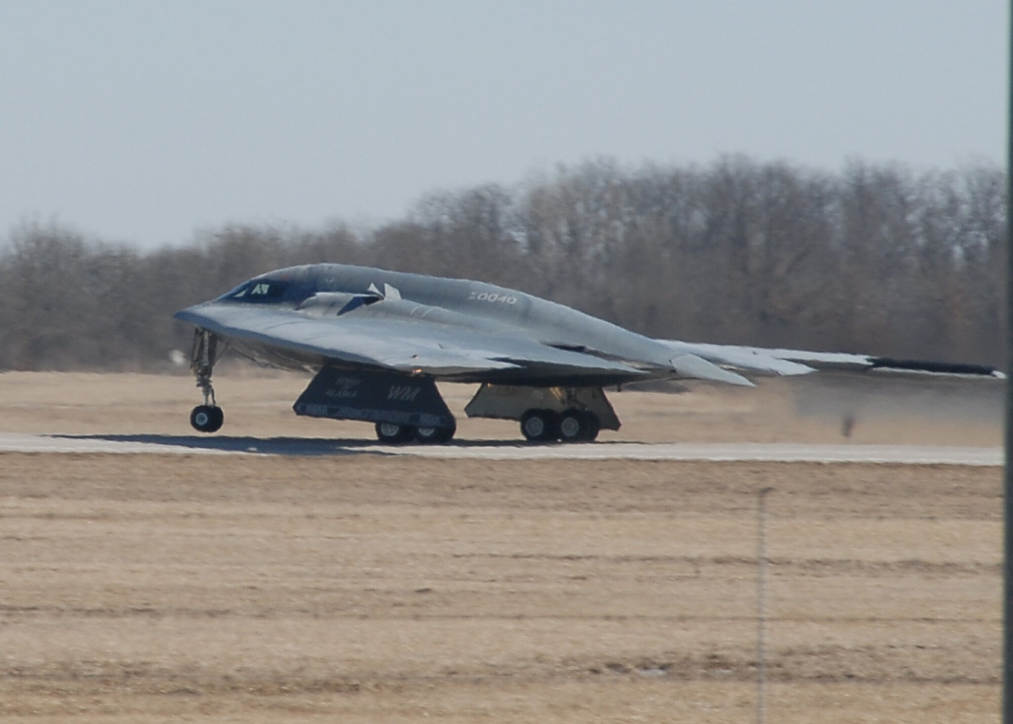 FINI FLIGHT.  
Col. Robert Leeker, 131st Bomb Wing Commander, Missouri Air National Guard, and 131st pilot Major Tim "Bling" Rezac, take to the skies in the B-2  Stealth Bomber "Spirit of Alaska" from Whiteman Air Force Base on February 25.  (U.S. Air Force Photo by Master Sergeant Mary-Dale Amison  RELEASED)  

