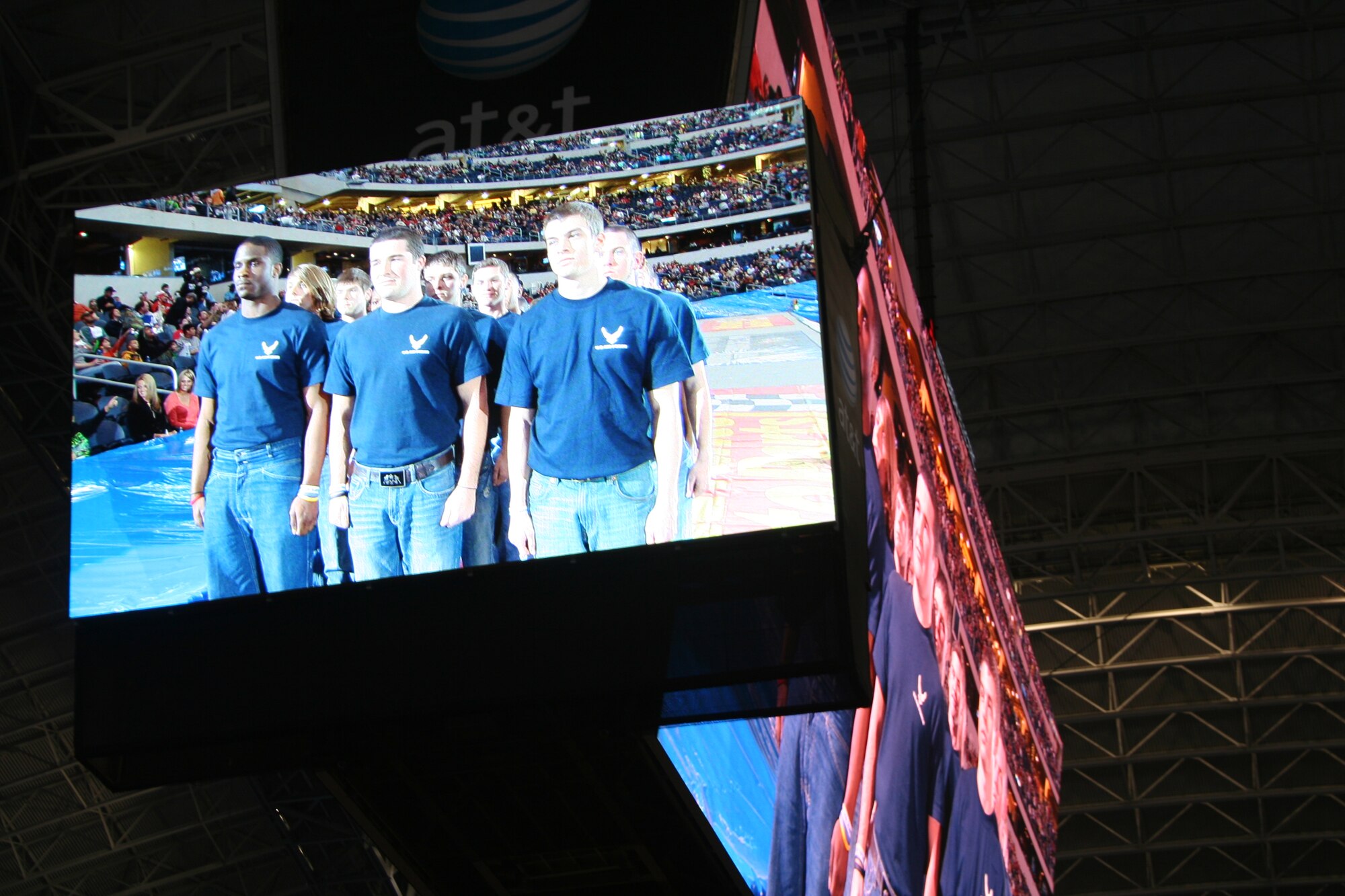 Members of the 344th Delayed Entry Program are displayed on the high-definition video board at Cowboys Stadium during a swear-in ceremony prior to Monster Jam, February 27, 2010, in Arlington, Texas. (U.S. Air Force photo/Technical Sgt. Dustin Beard) 