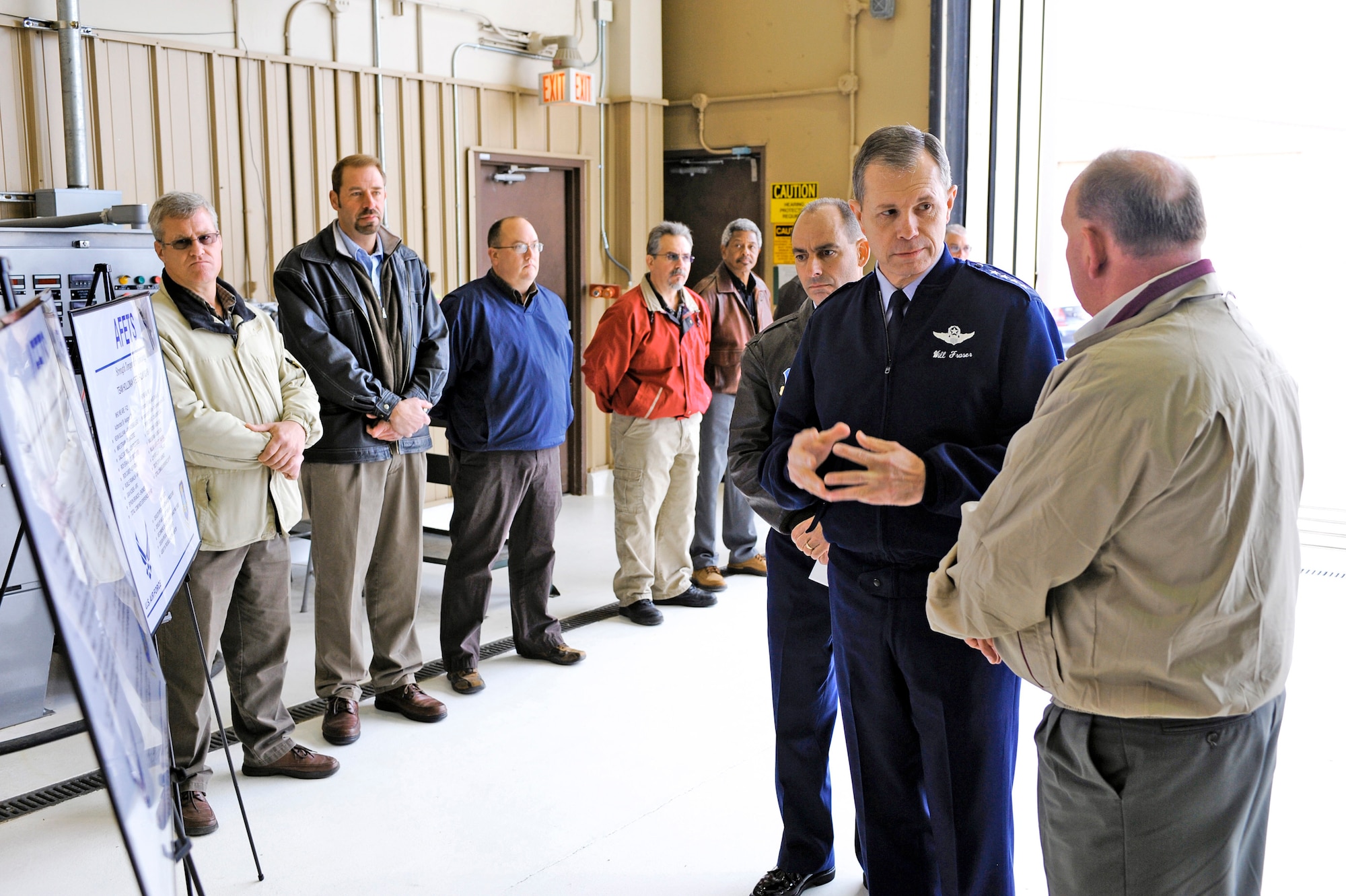 Gen. William M. Fraser III receives a briefing on the F-22 Raptor and its current status Feb. 22, 2010, at Holloman Air Force Base, N.M. General Fraser received briefings from many organizations around Holloman AFB during his tour. General Fraser is the commander of Air Combat Command. (U.S. Air Force photo/Senior Airman DeAndre Curtiss)