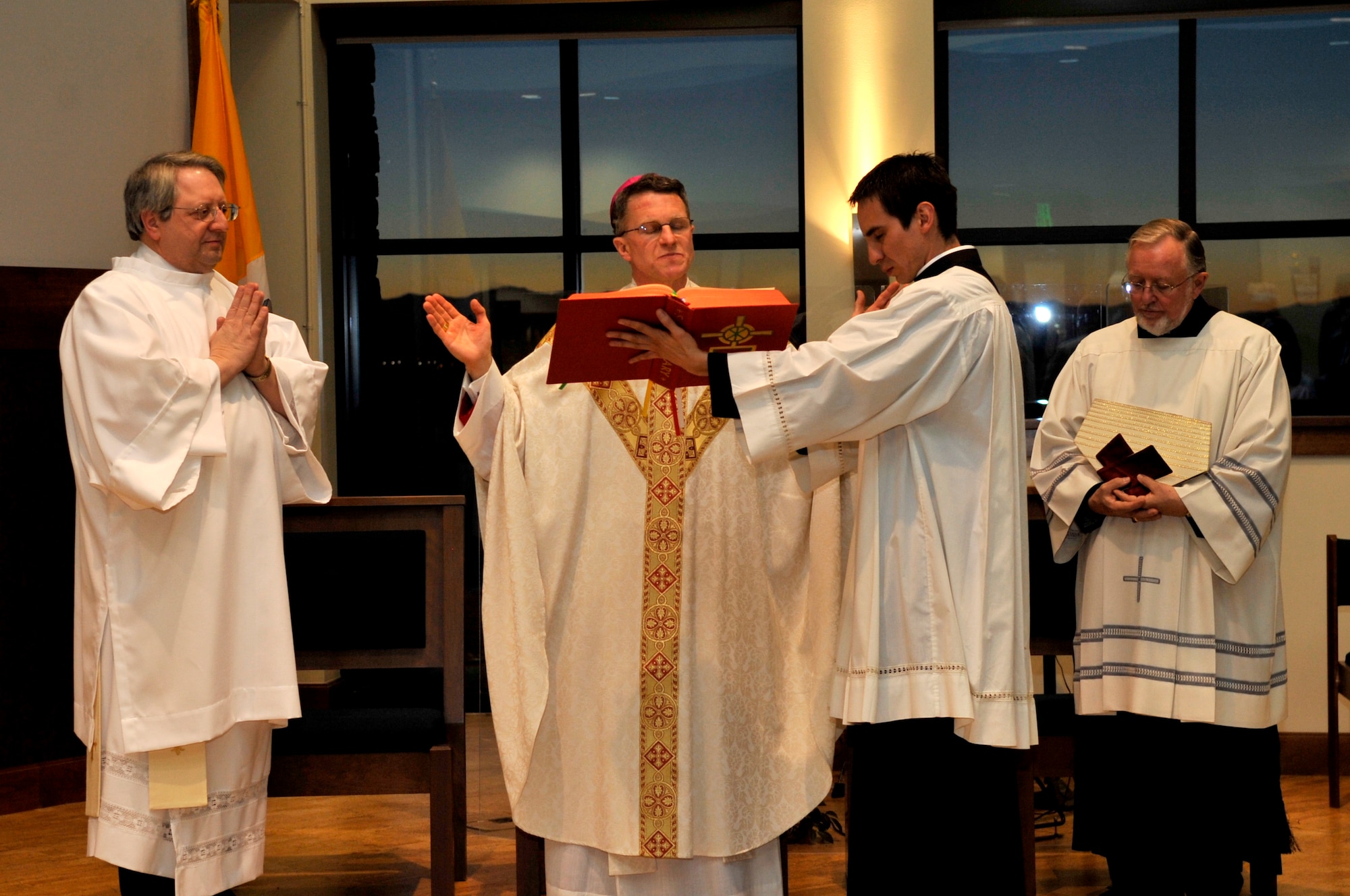 Archbishop Timothy Broglio, Roman Catholic Archbishop for Military Service in the United States, presides over the Sacrament of Confirmation at the Buckley Chapel Feb. 23. Archbishop Broglio confirmed one individual during the evening ceremony. (U.S. Air Force photo by Airman 1st Class Paul Labbe)
