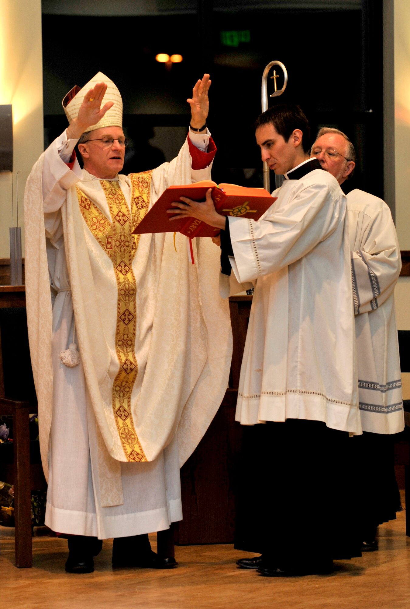 BUCKLEY AIR FORCE BASE, Colo. -- Archbishop Timothy Broglio, Roman Catholic Archbishop for Military Service in the United States, officiates over the sacrament of confirmation at the Buckley Chapel Feb. 23. Archbishop Broglio confirmed one individual during the evening ceremony. (U.S. Air Force photo by Airman 1st Class Paul Labbe)