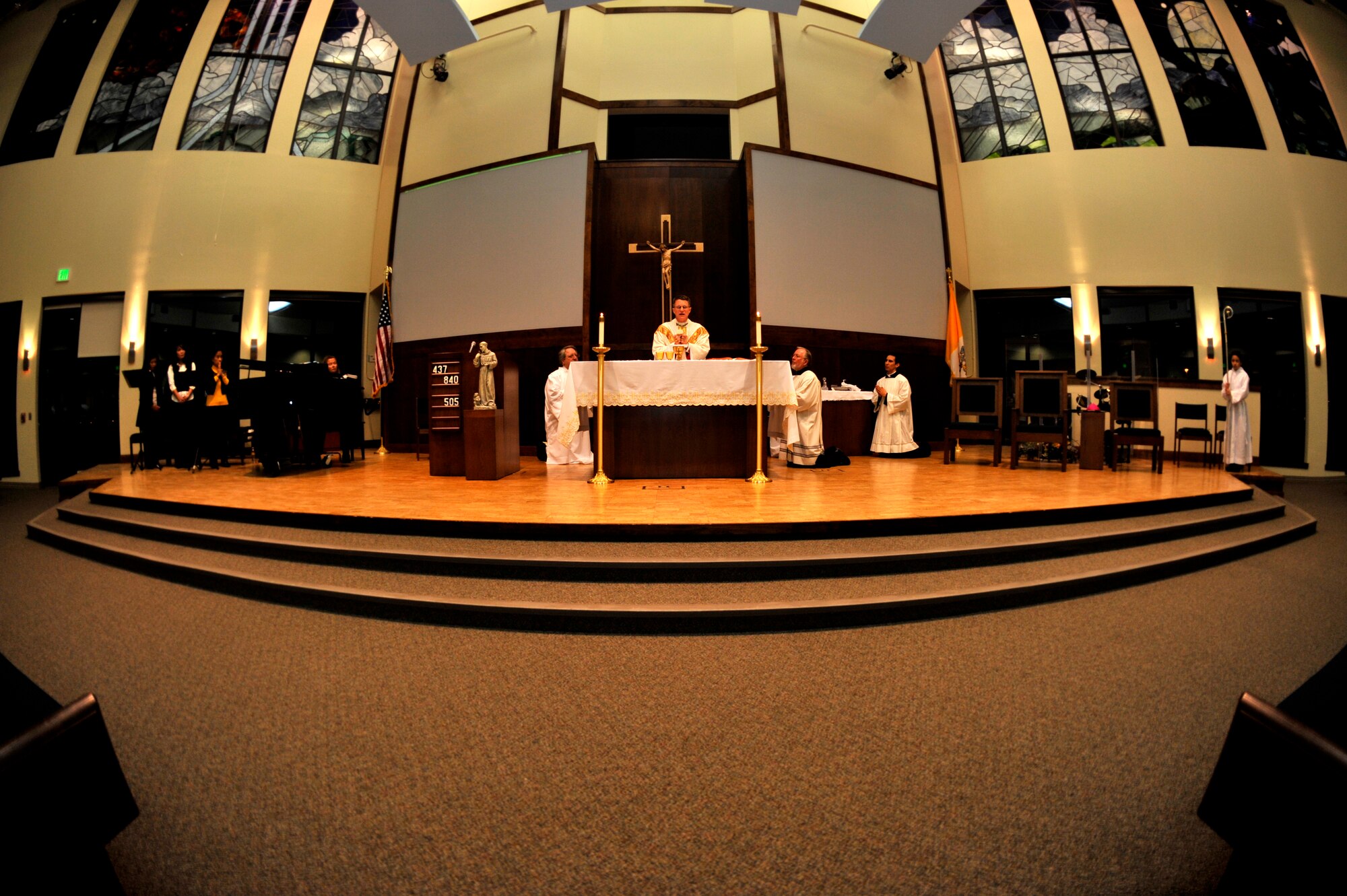 BUCKLEY AIR FORCE BASE, Colo. -- Archbishop Timothy Broglio officiates over the sacrament of confirmation Feb. 23 at the Buckley Chapel. Confirmation is one of seven sacraments celebrated by the Catholic faith. (U.S. Air Force photo by Airman 1st Class Paul Labbe)