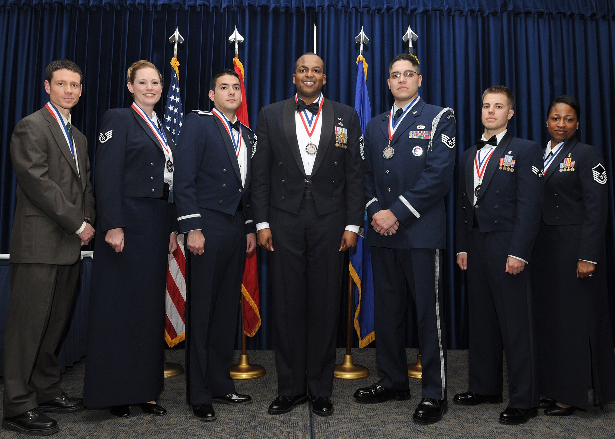 The 39th Air Base Wing 2009 Annual Award winners pose for a group photo during the awards banquet at Incirlik’s Consolidated Club Friday, Feb. 26, 2010.  Each winner was presented a plaque by guest speaker, Lt. Gen. Ralph J. Jodice II, Allied Component Command and 16th Air Expeditionary Task Force commander.  (U.S. Air Force photo/Senior Airman Ashley Wood)  