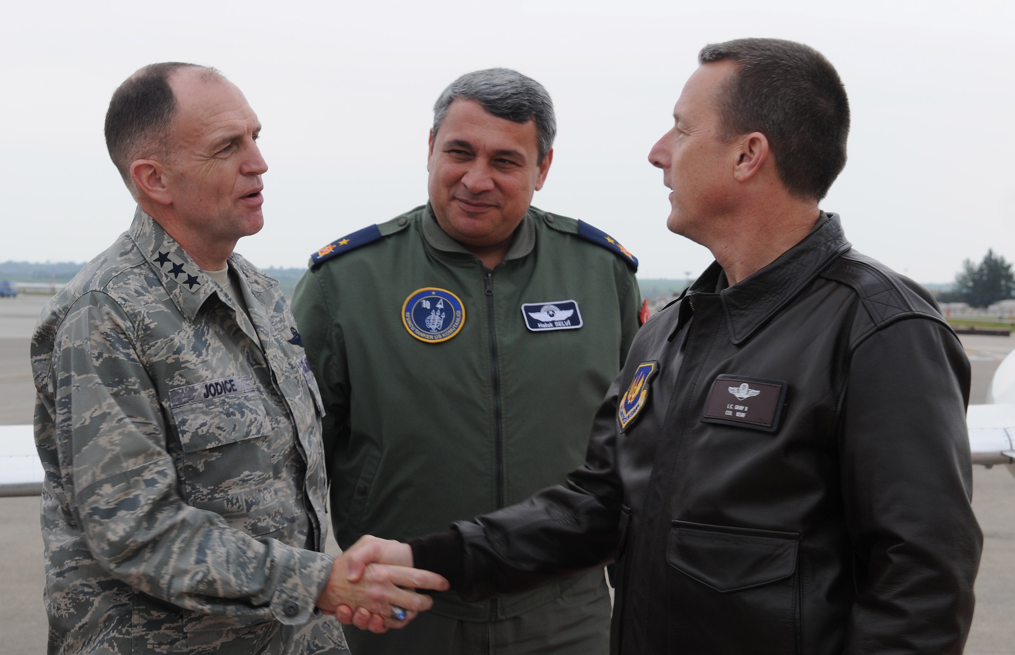 Turkish Air Force Brig. Gen. Haluk Selvi, 10th Tanker Base commander (middle), and Col. Lawrence Gray II, 39th Air Base Wing vice commander (right), welcome Lt. Gen. Ralph J. Jodice II, Allied Component Command and 16th Air Expeditionary Task Force commander, to Incirlik Air Base, Turkey Friday, Feb. 26, 2010.  General Jodice visited Incirlik as the guest speaker for the 2009 Annual Awards banquet.   (U.S. Air Force photo/Senior Airman Ashley Wood)  