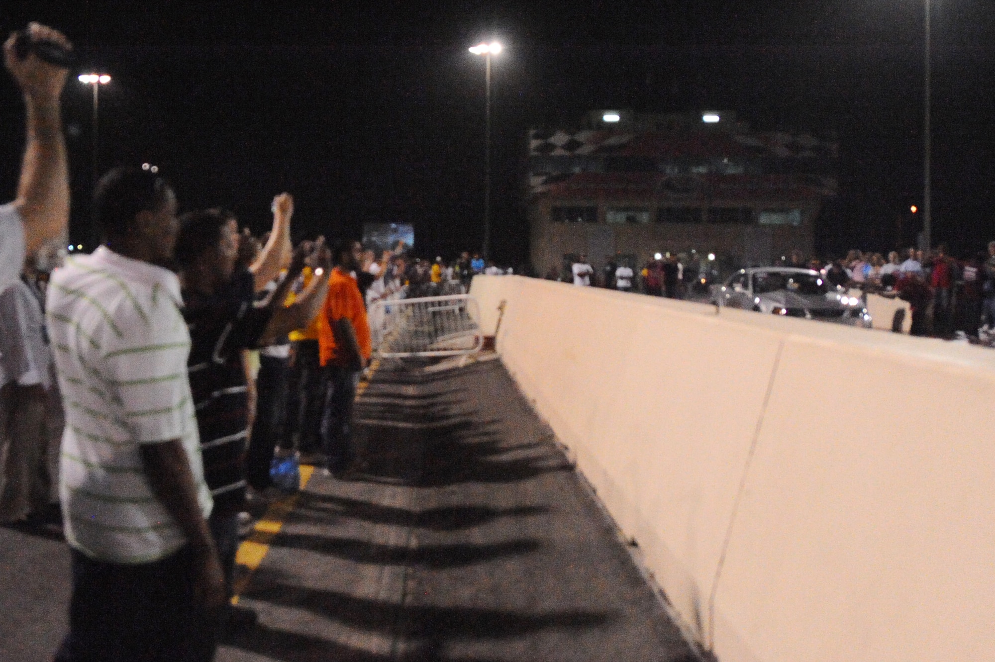 More than 300 U.S. Servicemembers attend a drag racing event at a non-disclosed Southwest Asia location Feb. 26, 2010. (U.S. Air Force photo by Senior Airman Kasey Zickmund)[RELEASED]
