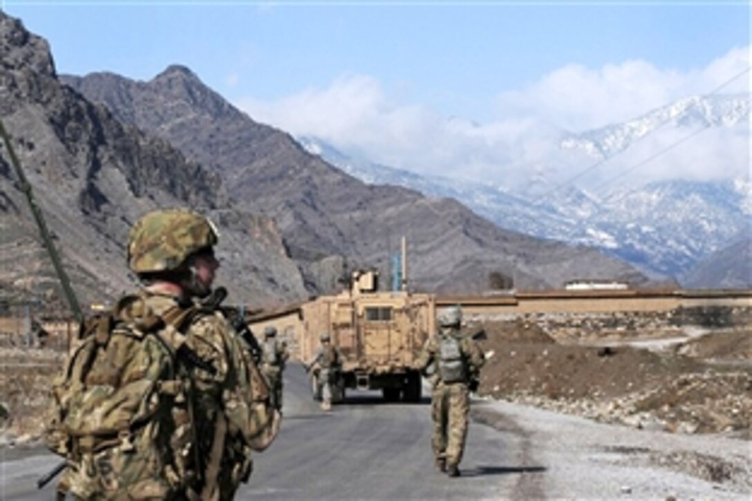 U.S. Army Spc. Brian E. King conducts a patrol with his unit and Afghan soldiers in the Ghabalay village area in eastern Afghanistan’s Kunar province, Feb. 16, 2010. King is the forward observer assigned to Company D, 2nd Battalion, 12th Infantry Regiment.