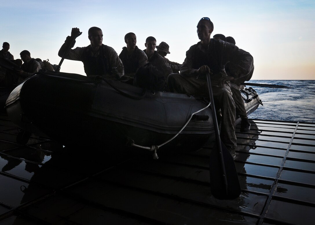 U.S. Marines assigned to the 31st Marine Expeditionary Unit prepare to launch a combat rubber raiding crafts (CRRC) during a CRRC training mission aboard forward-deployed amphibious assault ship USS Essex (LHD 2), under way in the South China Sea, March 3, 2010. Essex, commanded by Capt. Troy Hart, is part of the forward-deployed Essex Amphibious Ready Group and is conducting spring patrol throughout the Western Pacific region.