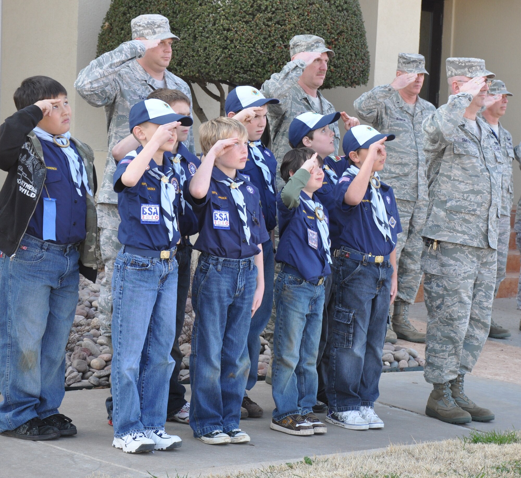 Boy Scouts of America, Troop 232 at Sheppard, present arms to the U.S. flag during Retreat at the 82nd Training Wing Headquarters building March 2. After the observance, Brig. Gen. O.G. Mannon, 82nd TRW commander, and Col. Michael Hake, 82nd TRW vice commander, congratulated the boys on an outstanding salute. (U.S. Air Force photo/Airman 1st Class Valerie Hosea)

