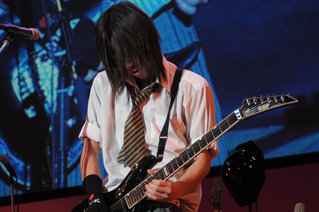 Final Approach performed with local Japanese high school students in a joint concert consisting of four choirs, horn players from Fussa wind ensemble, and the Tokyo Metropolitan Fussa high school rock band.  The theme was “Melody Line Connecting Hearts”.   Each group performed individually and everyone came together to perform the final selection “We Are the World”.  This event was a great way to enhance the relations and partnership that Yokota AB, and Fussa City/ local neighboring cities have shared over the past 50 years.  NCOIC of Final Approach MSgt Packard had this to say about the event, “This was a great opportunity to interact with our local neighbors, and share the importance of Yokota’s mission to the Japanese people.”