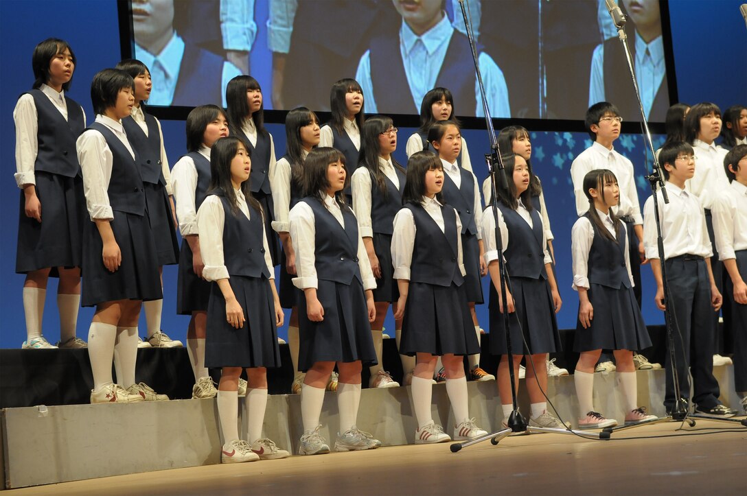 Final Approach performed with local Japanese high school students in a joint concert consisting of four choirs, horn players from Fussa wind ensemble, and the Tokyo Metropolitan Fussa high school rock band.  The theme was “Melody Line Connecting Hearts”.   Each group performed individually and everyone came together to perform the final selection “We Are the World”.  This event was a great way to enhance the relations and partnership that Yokota AB, and Fussa City/ local neighboring cities have shared over the past 50 years.  NCOIC of Final Approach MSgt Packard had this to say about the event, “This was a great opportunity to interact with our local neighbors, and share the importance of Yokota’s mission to the Japanese people.”
