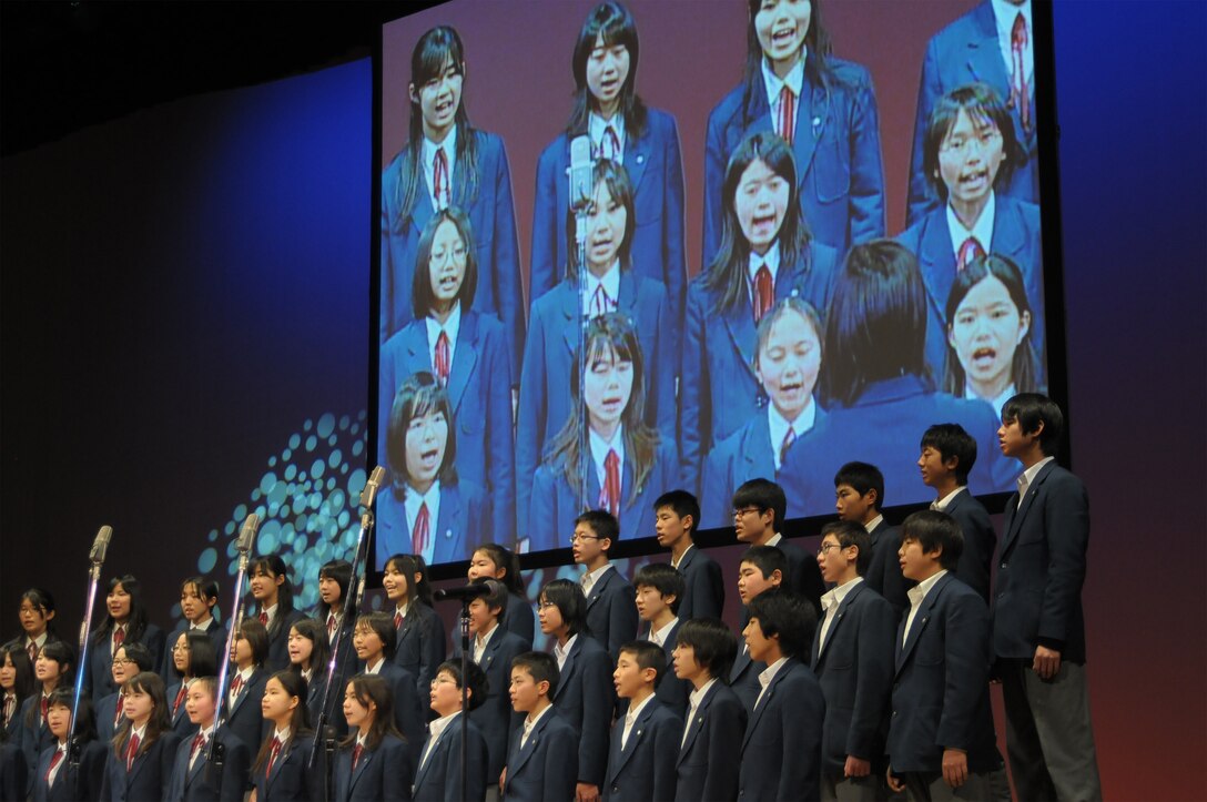 Final Approach performed with local Japanese high school students in a joint concert consisting of four choirs, horn players from Fussa wind ensemble, and the Tokyo Metropolitan Fussa high school rock band.  The theme was “Melody Line Connecting Hearts”.   Each group performed individually and everyone came together to perform the final selection “We Are the World”.  This event was a great way to enhance the relations and partnership that Yokota AB, and Fussa City/ local neighboring cities have shared over the past 50 years.  NCOIC of Final Approach MSgt Packard had this to say about the event, “This was a great opportunity to interact with our local neighbors, and share the importance of Yokota’s mission to the Japanese people.”