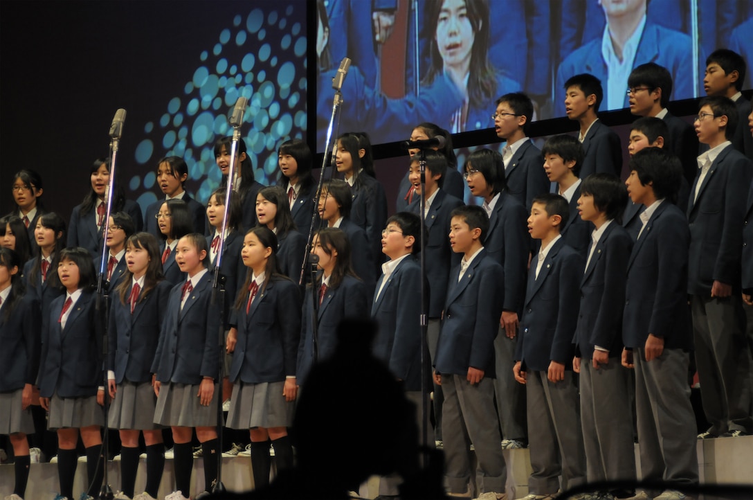 Final Approach performed with local Japanese high school students in a joint concert consisting of four choirs, horn players from Fussa wind ensemble, and the Tokyo Metropolitan Fussa high school rock band.  The theme was “Melody Line Connecting Hearts”.   Each group performed individually and everyone came together to perform the final selection “We Are the World”.  This event was a great way to enhance the relations and partnership that Yokota AB, and Fussa City/ local neighboring cities have shared over the past 50 years.  NCOIC of Final Approach MSgt Packard had this to say about the event, “This was a great opportunity to interact with our local neighbors, and share the importance of Yokota’s mission to the Japanese people.”