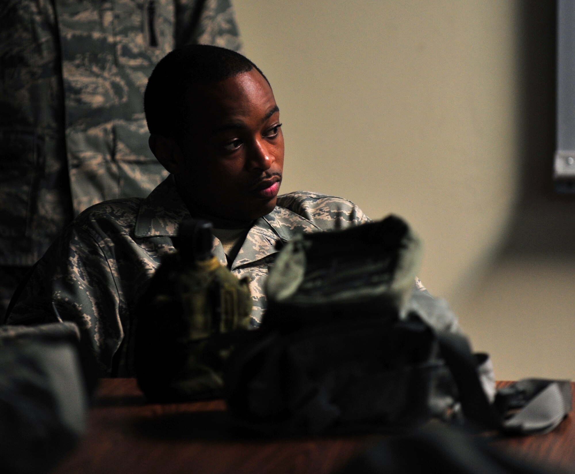 Senior Airman Jeff Bruce, 18th Munitions Squadron precision guided munitions crew chief, takes part in an  Ability to Survive and Operate (ATSO) course Feb. 24. The 18th MUNS held an ATSO course Feb. 24-March 2 for Airmen to hone their skills as AMMO warriors and learn how to perform their trade in a hostile environment. Over 200 members were trained in Mission Oriented Protective Posture wear, asset protection, post attack reconnaissance sweeps, unidentified explosive ordnance identification/reporting, and finished with a hands-on refresher of self aid buddy care. (U.S. Air Force photo/Tech. Sgt. Rey Ramon)