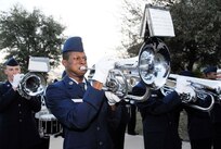 Airman Basic Justin Jackson, 323rd Training Squadron, performs with the 737th Training Group Drum and Bugle Corps before the San Antonio Rampage game at the AT&T Center Feb. 27. The performance was part of military appreciation night which featured several pre-game interactive activities honoring servicemembers. The Manitoba Moose beat the Rampage 3-1. (U.S. Air Force photo/Alan Boedeker)