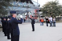 The 737th Training Group Drum and Bugle Corps performs before the San Antonio Rampage game at the AT&T Center Feb. 27. The performance was part of military appreciation night which featured several pre-game interactive activities honoring servicemembers. The Manitoba Moose beat the Rampage 3-1. (U.S. Air Force photo/Alan Boedeker)
