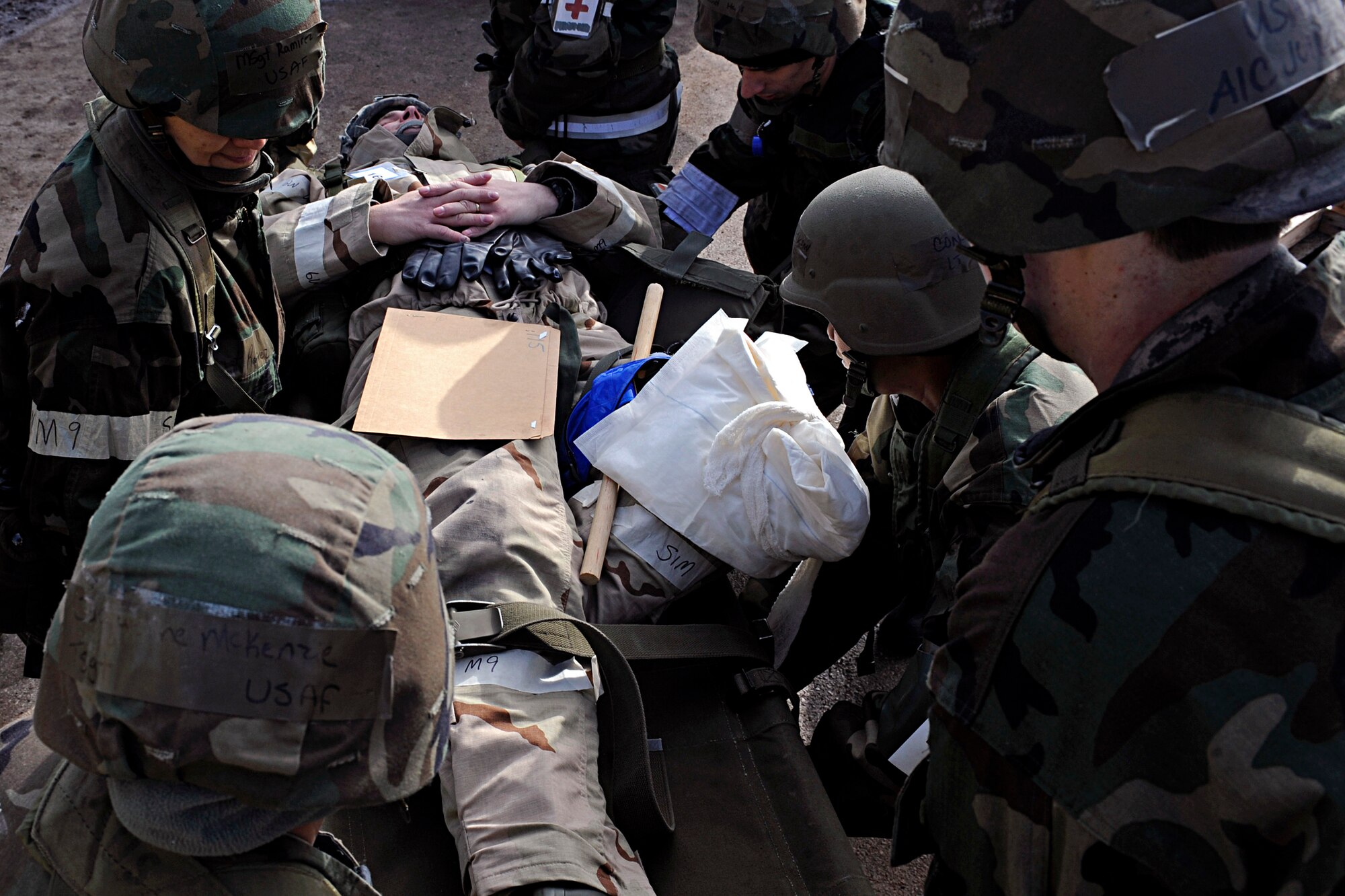 ELLSWORTH AIR FORCE BASE, S.D. -- Airmen from the 28th Medical Group prepare a patient for a simulated aero medical evacuation during a Phase II Operational Readiness Exercise, March 3. The Phase II ORE tested the ability of Airmen to operate in a deployed environment. (U.S. Air Force photo/Airman 1st Class Matthew Flynn)