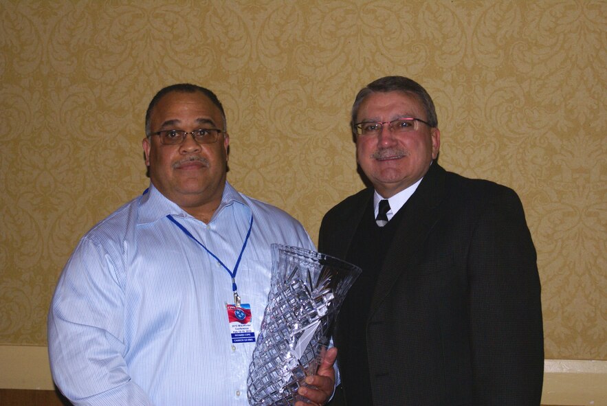 Right, Brandon Ward, Tennessee Ambulance Service Association's (TASA) vice president, presents Ricky Cope, left, with the 2010 Tommy Erwin Lifetime Achievement Award at TASA’s annual convention in Gatlinburg Feb. 18. (Photo provided)